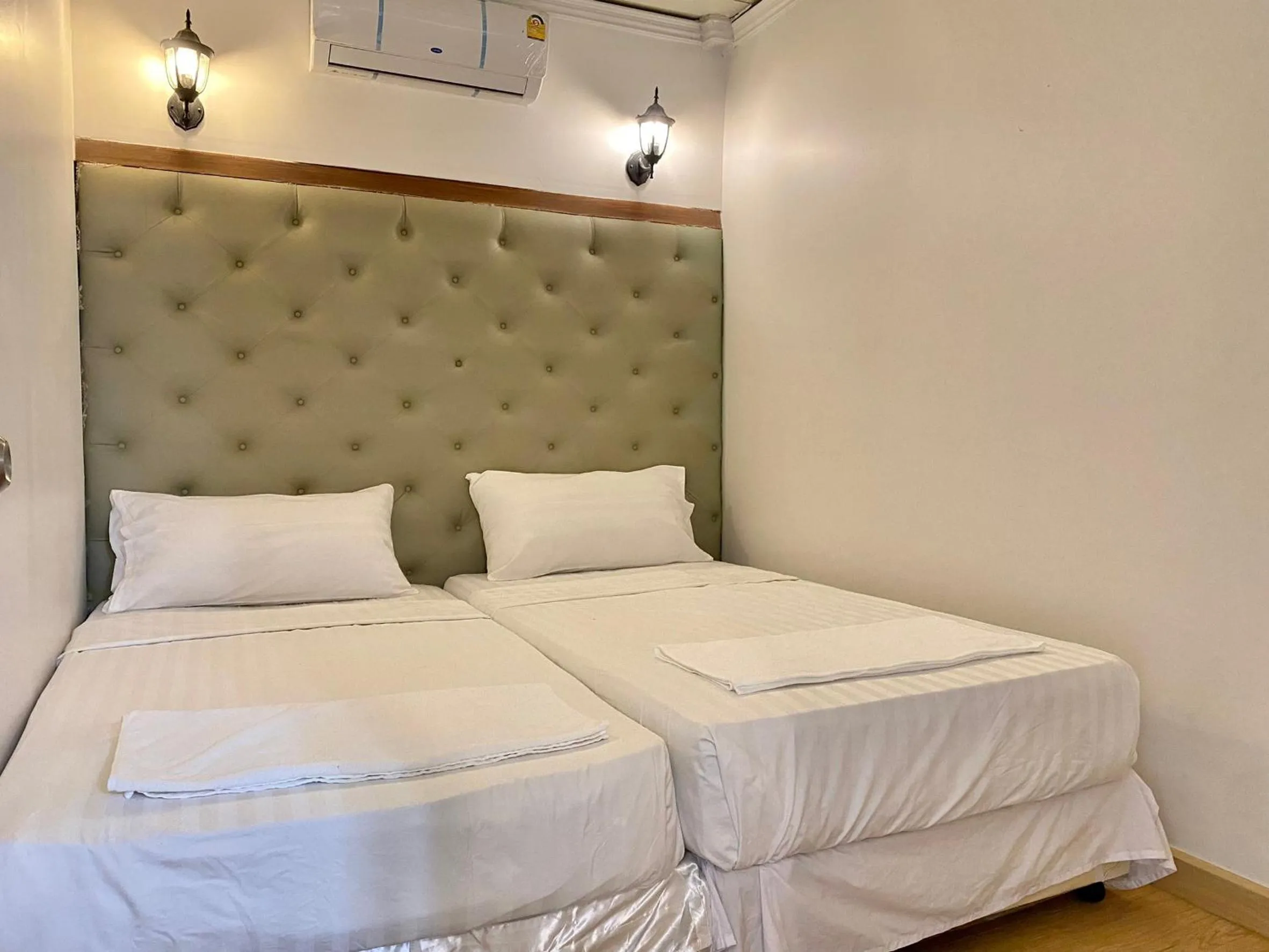 Bed in Marc Hotel Maesai