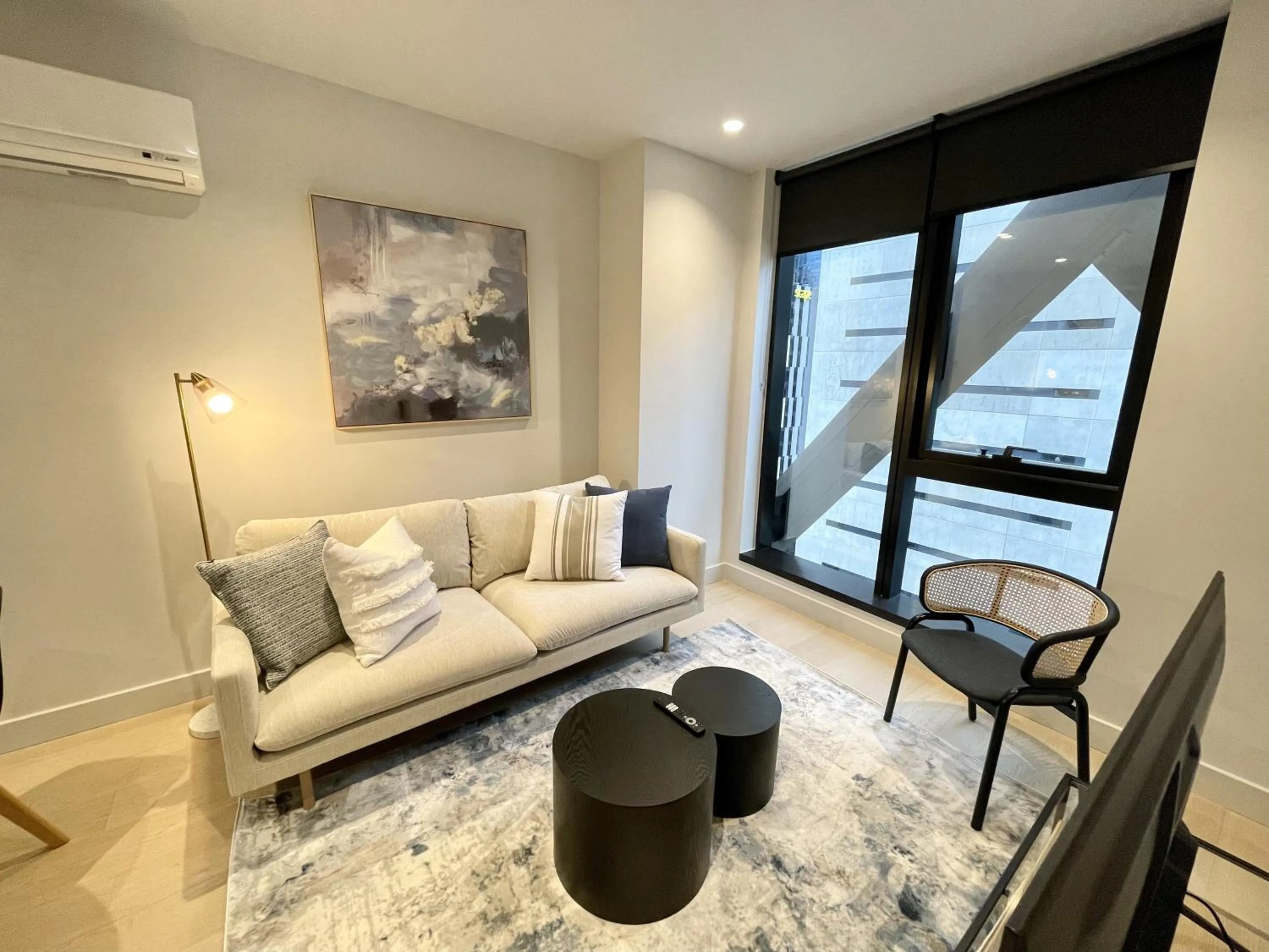 Living room in Paragon Apartments by CLLIX