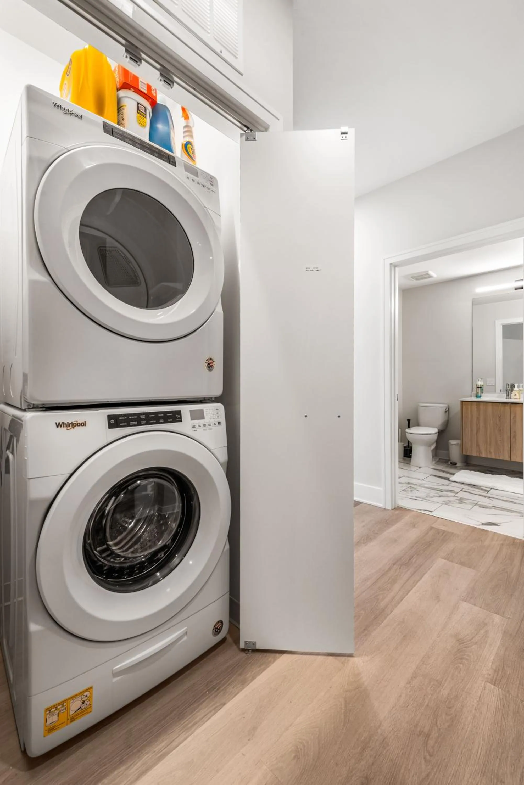 washing machine in Avra Stylish Apartments Prime West Loop Location Near Union Park