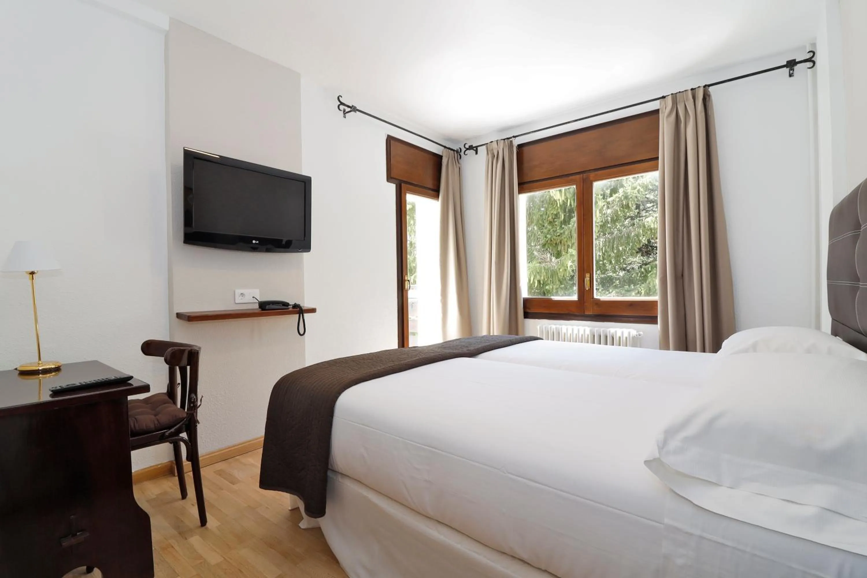 Bed in Hotel Blu Aran