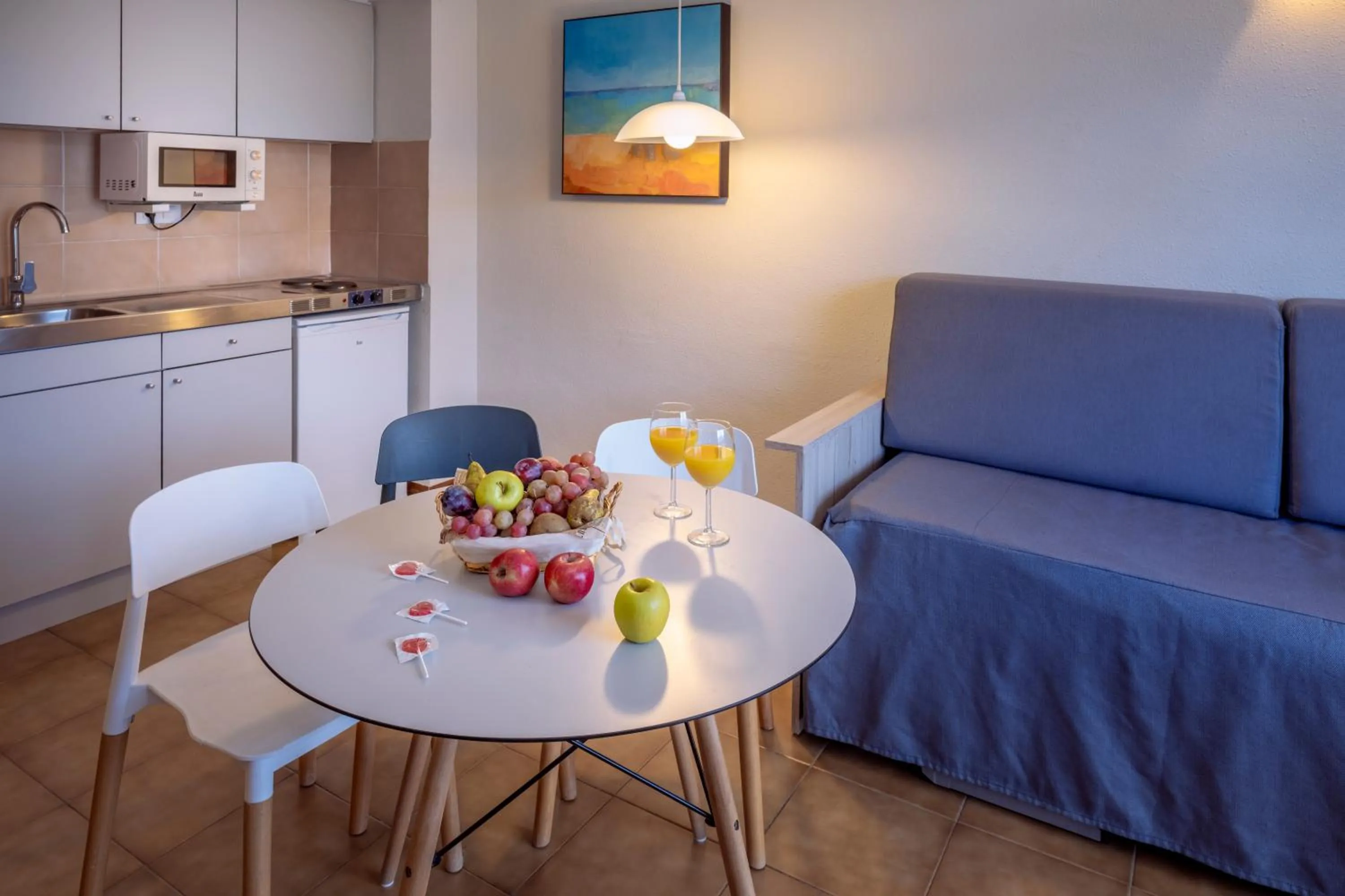 Kitchen or kitchenette in GHT Aparthotel Tossa Park