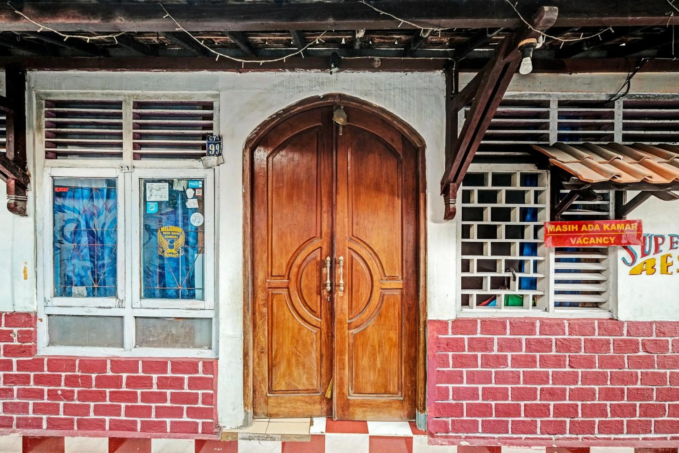 Facade/entrance in SPOT ON 91915 Homestay Superman