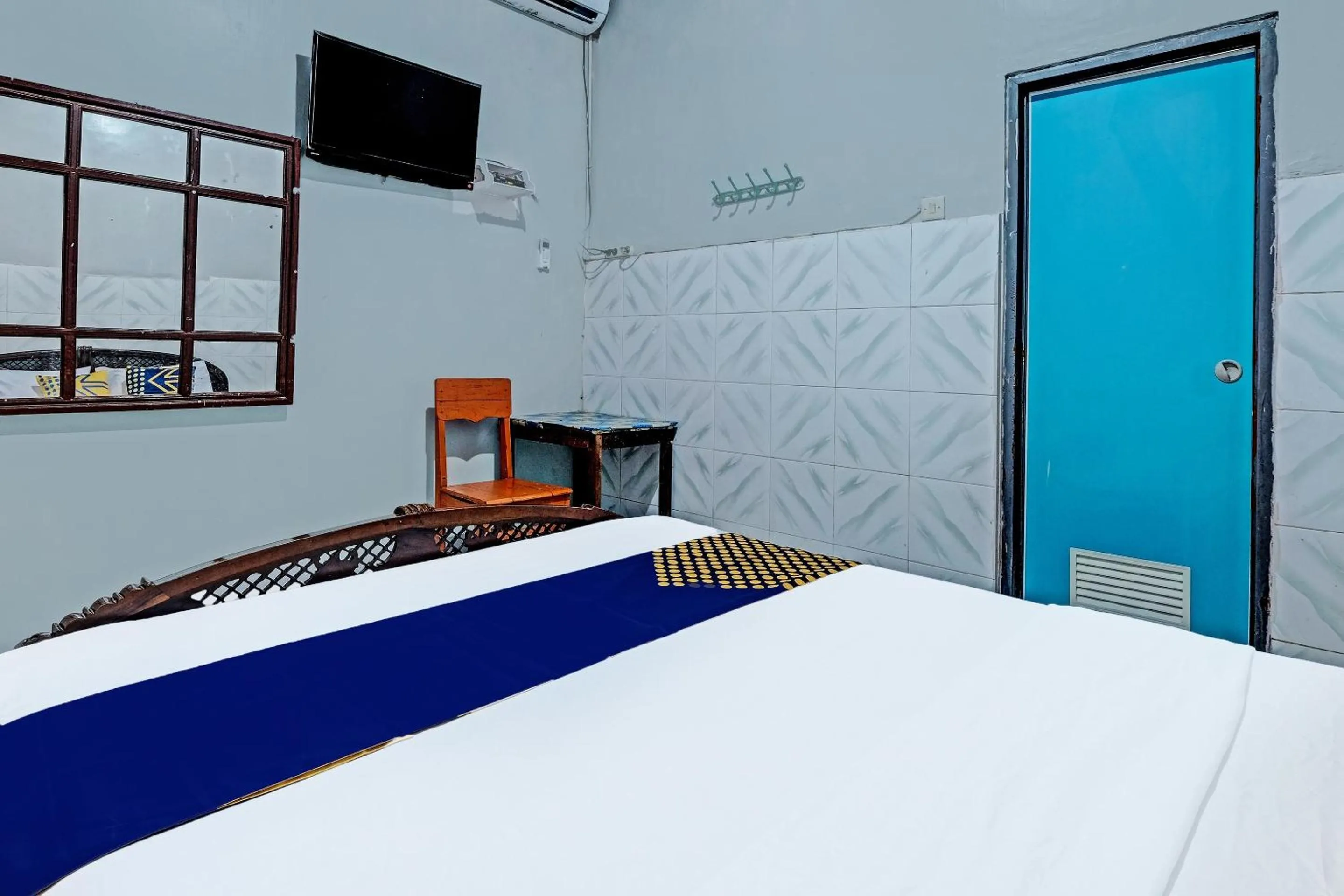 Bedroom in SPOT ON 91915 Homestay Superman