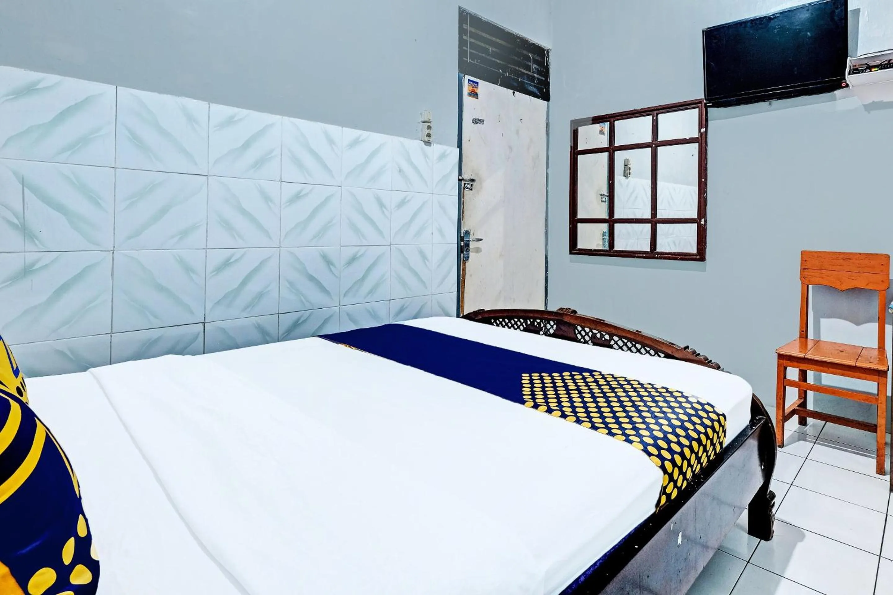 Bedroom in SPOT ON 91915 Homestay Superman