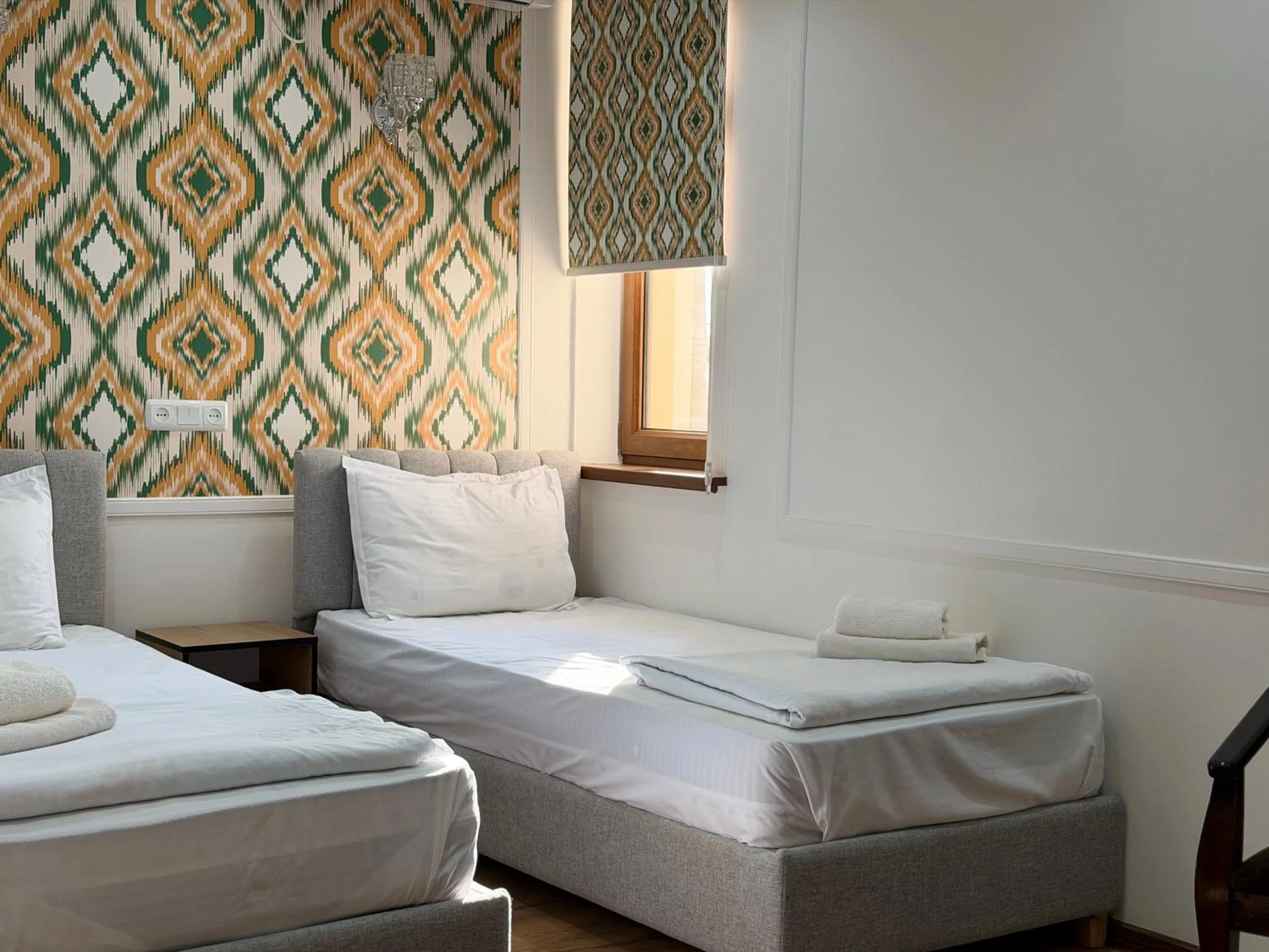 Bed in Ulli Oy Boutique Hotel & Terrace