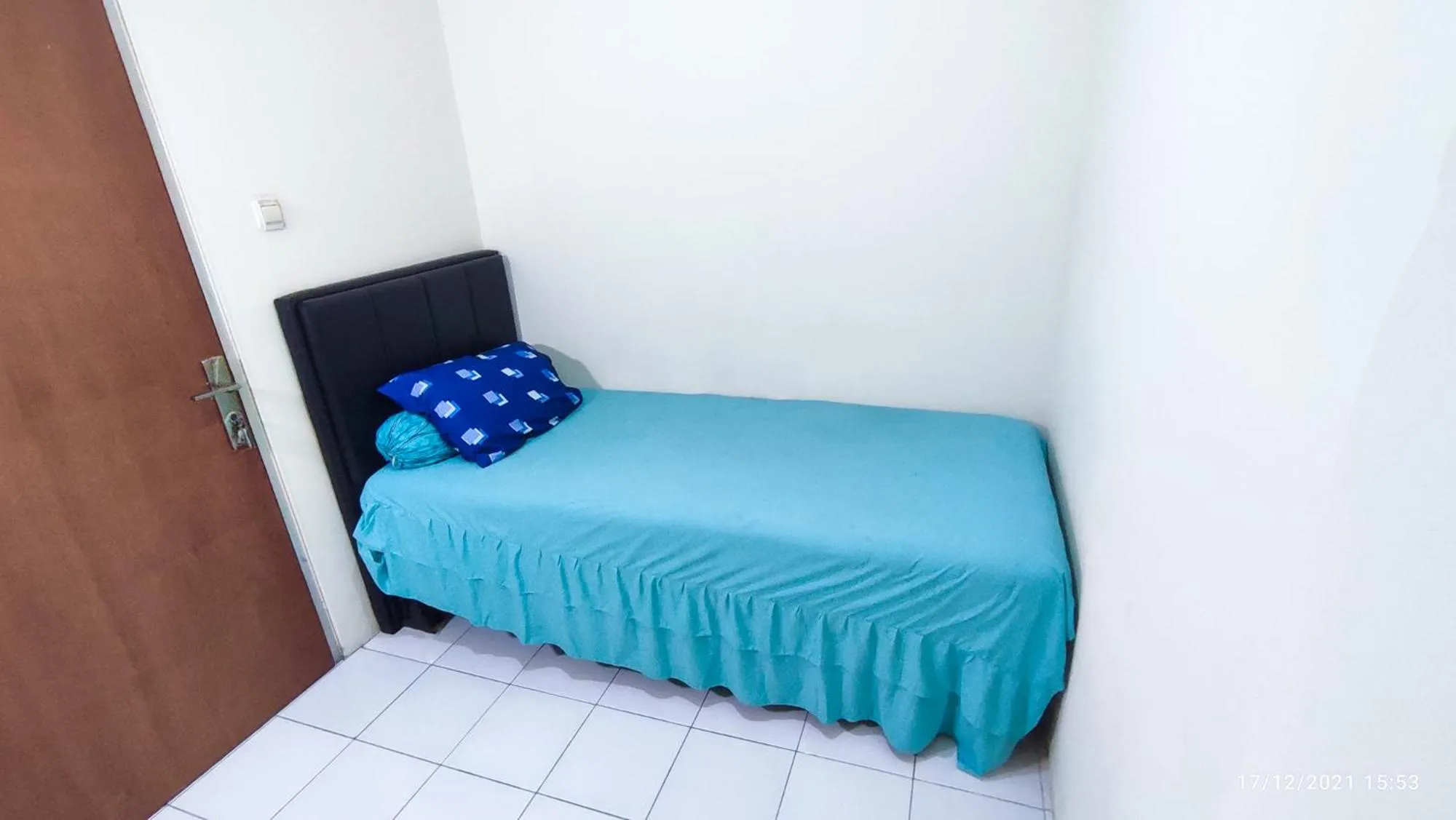 Bed in Lily Room at Apartment Cibubur Village