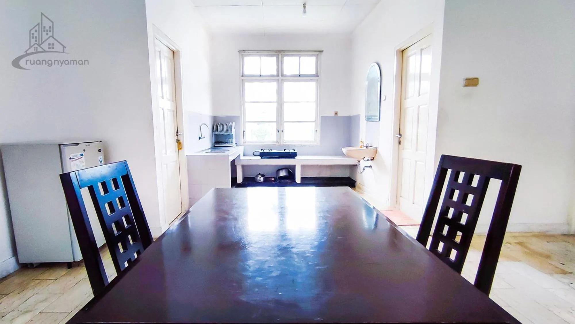 Kitchen or kitchenette in Sukanagalih Resort by Ruang Nyaman