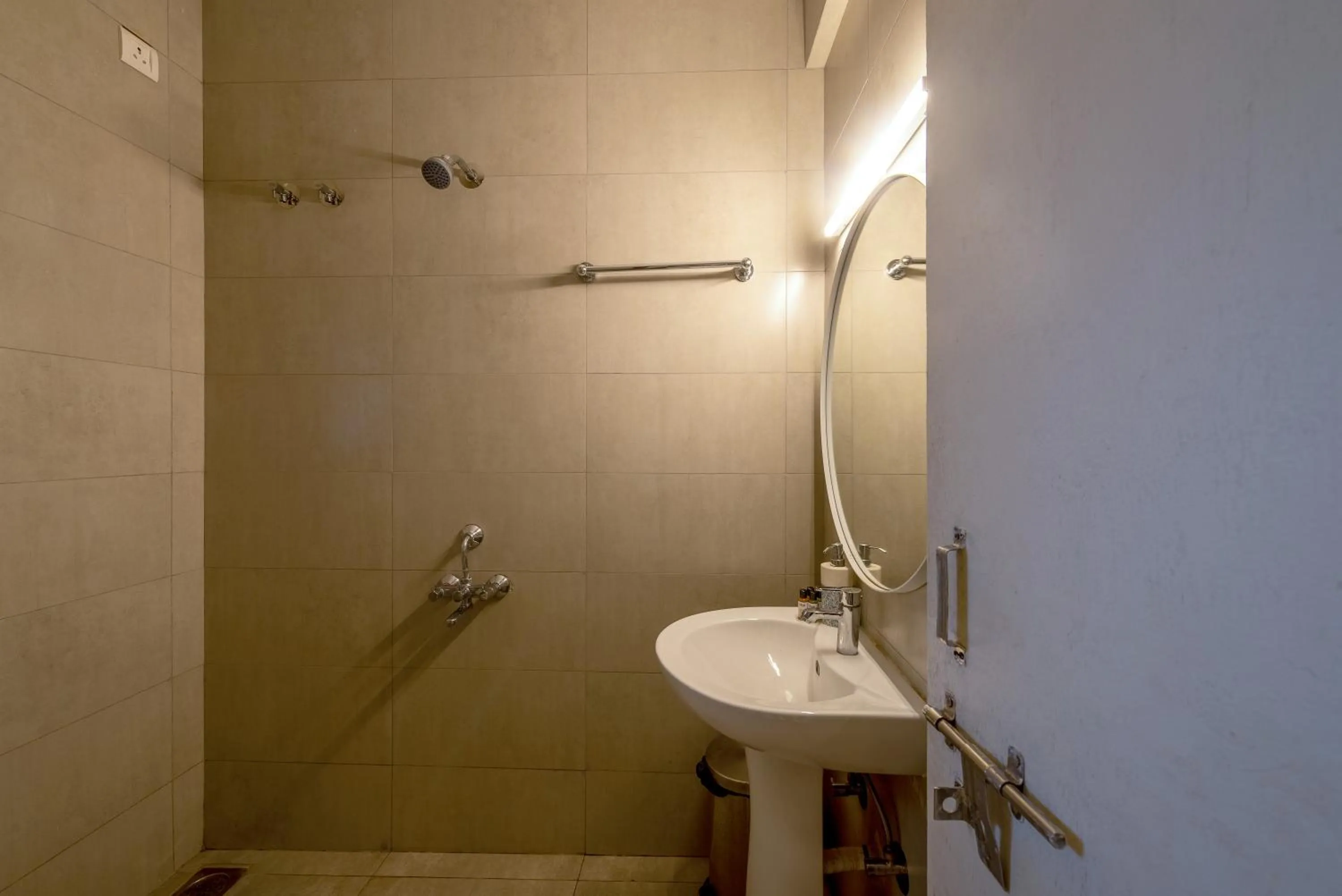 Toilet in Olive Hotel Calangute Niwasa by Embassy Group