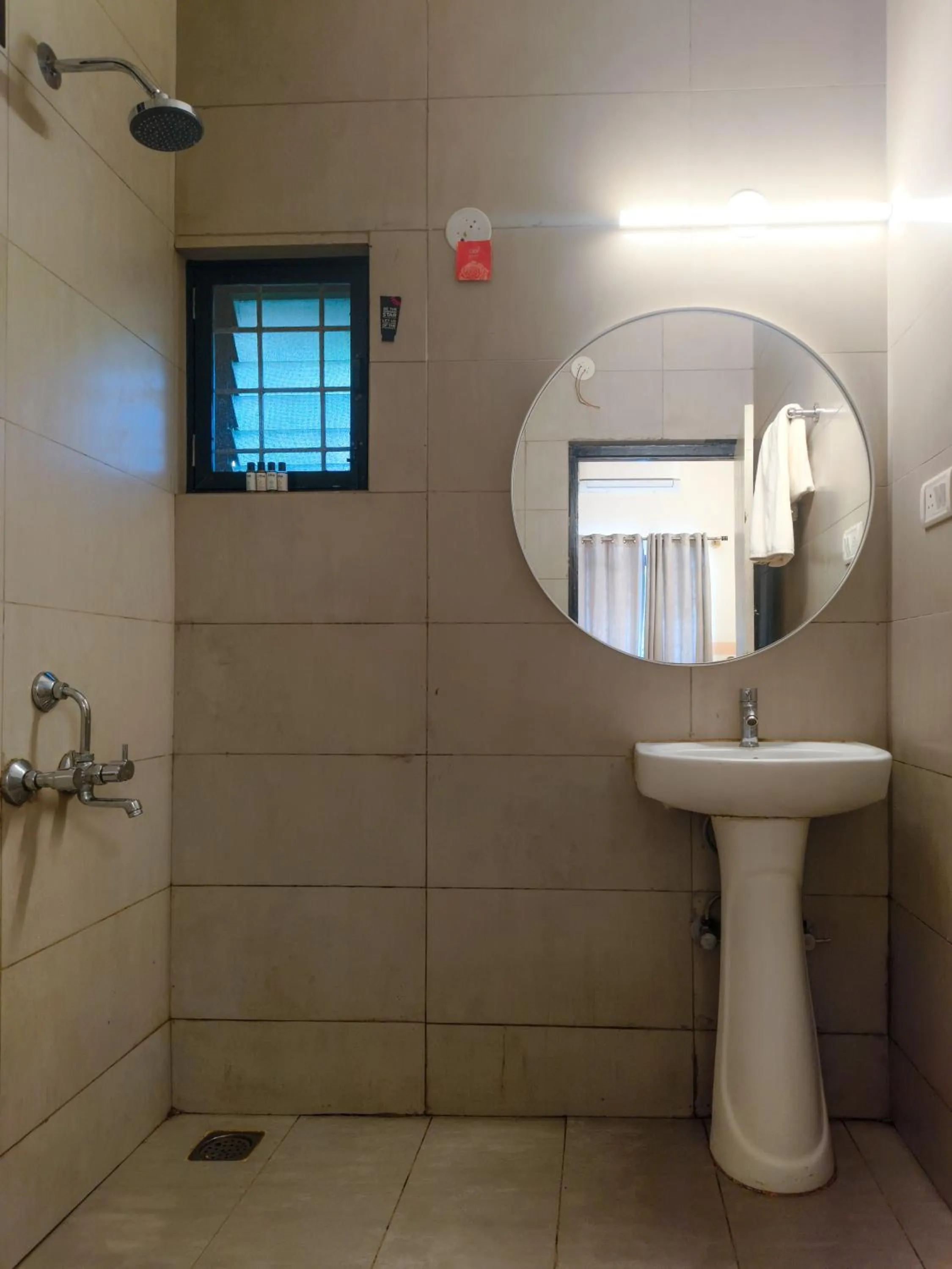 Bathroom in Olive Hotel Calangute Niwasa by Embassy Group