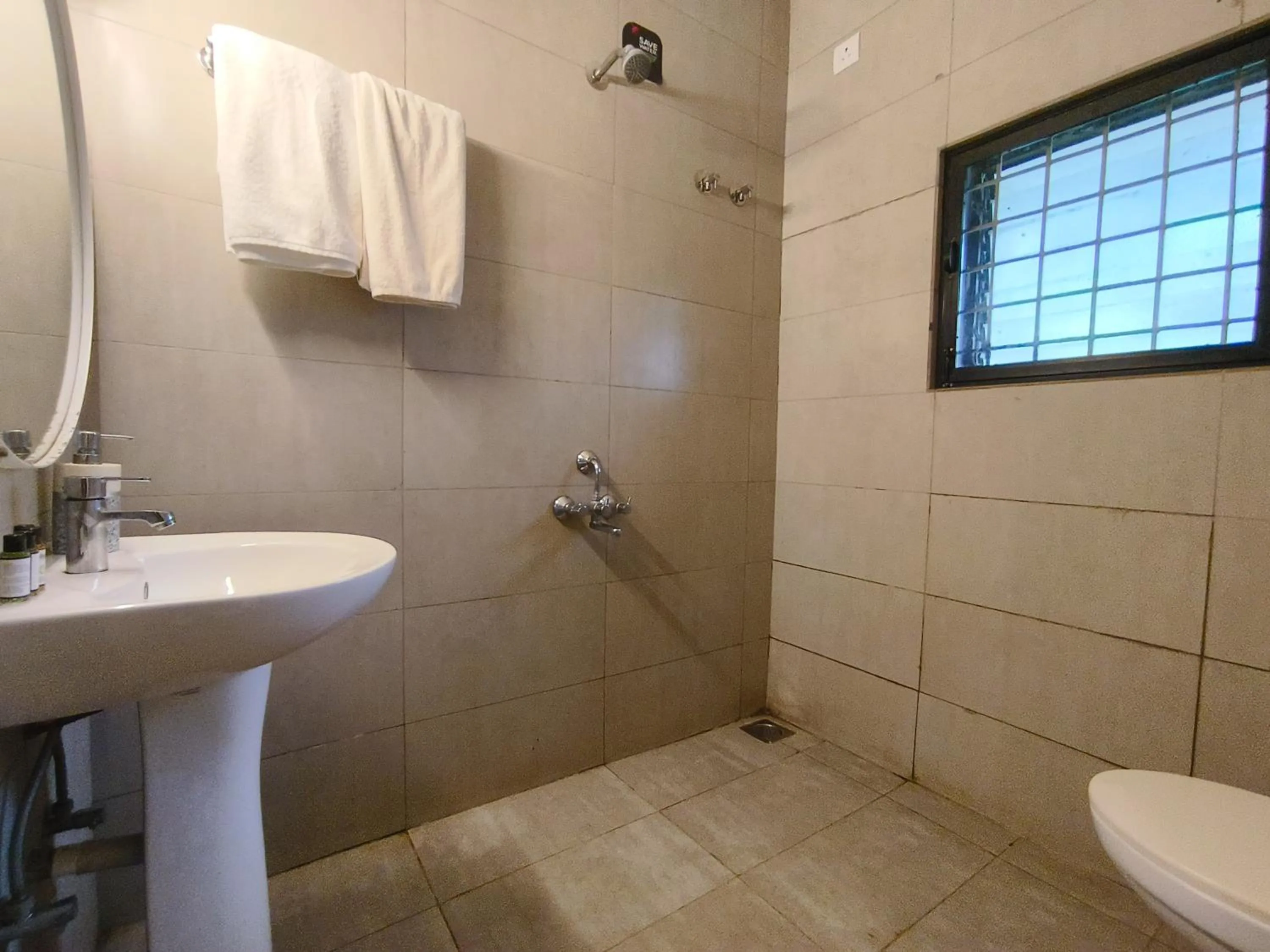 Bathroom in Olive Hotel Calangute Niwasa by Embassy Group