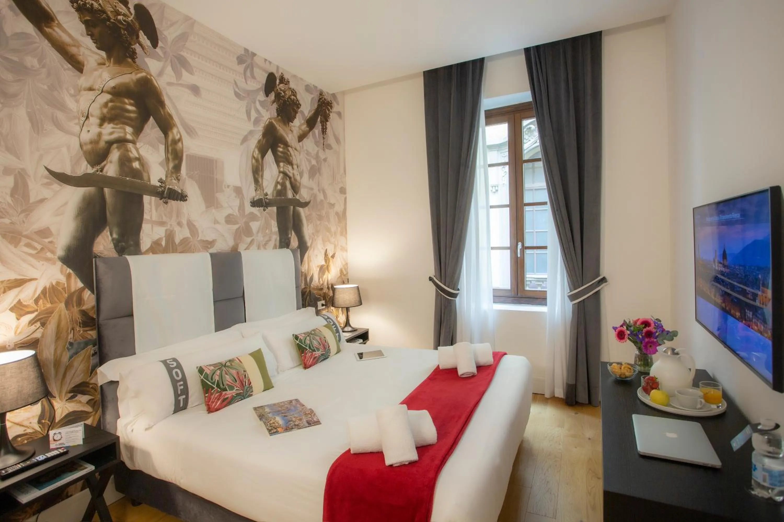 Photo of the whole room, Bed in Casual Rinascimento Firenze