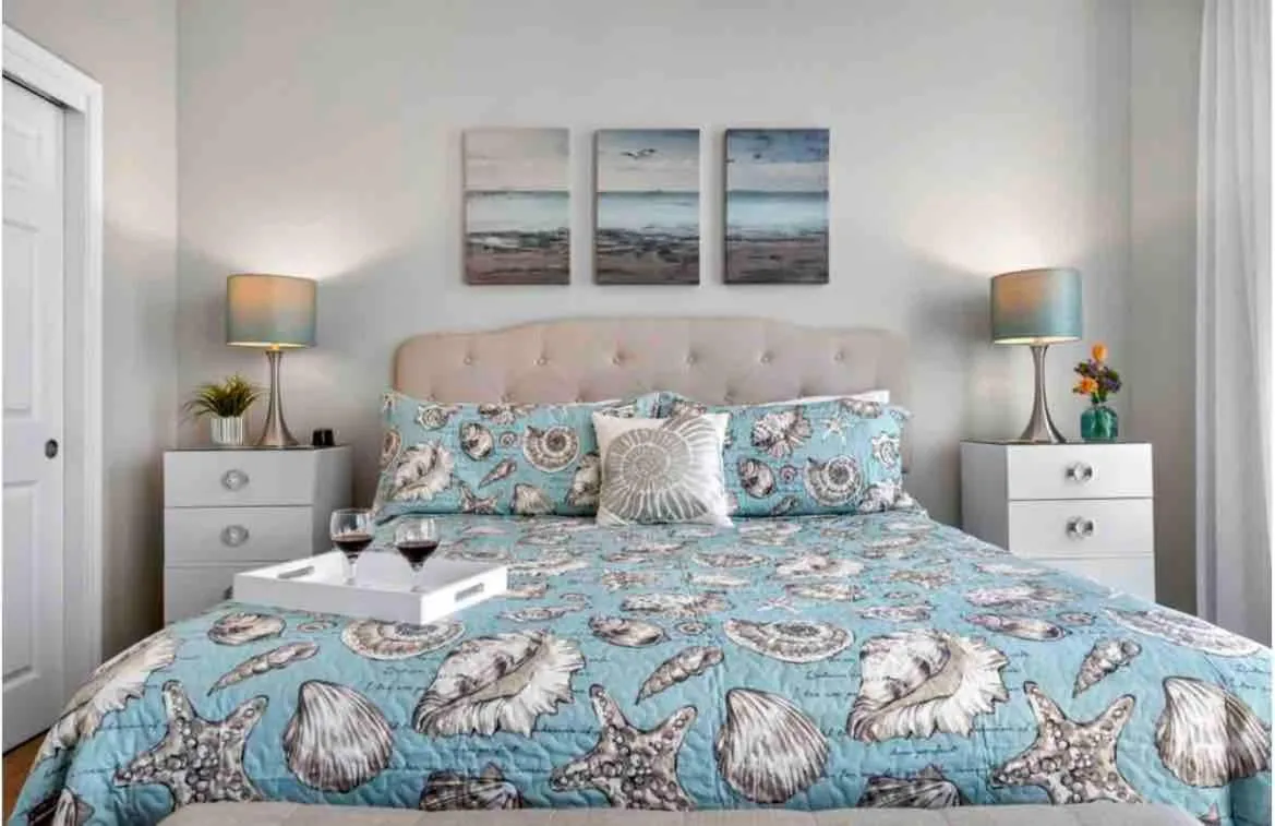 Bed in Pink Sunsets at the Palms of Destin Across from Beach, Heated Pool Shuttle & Dining