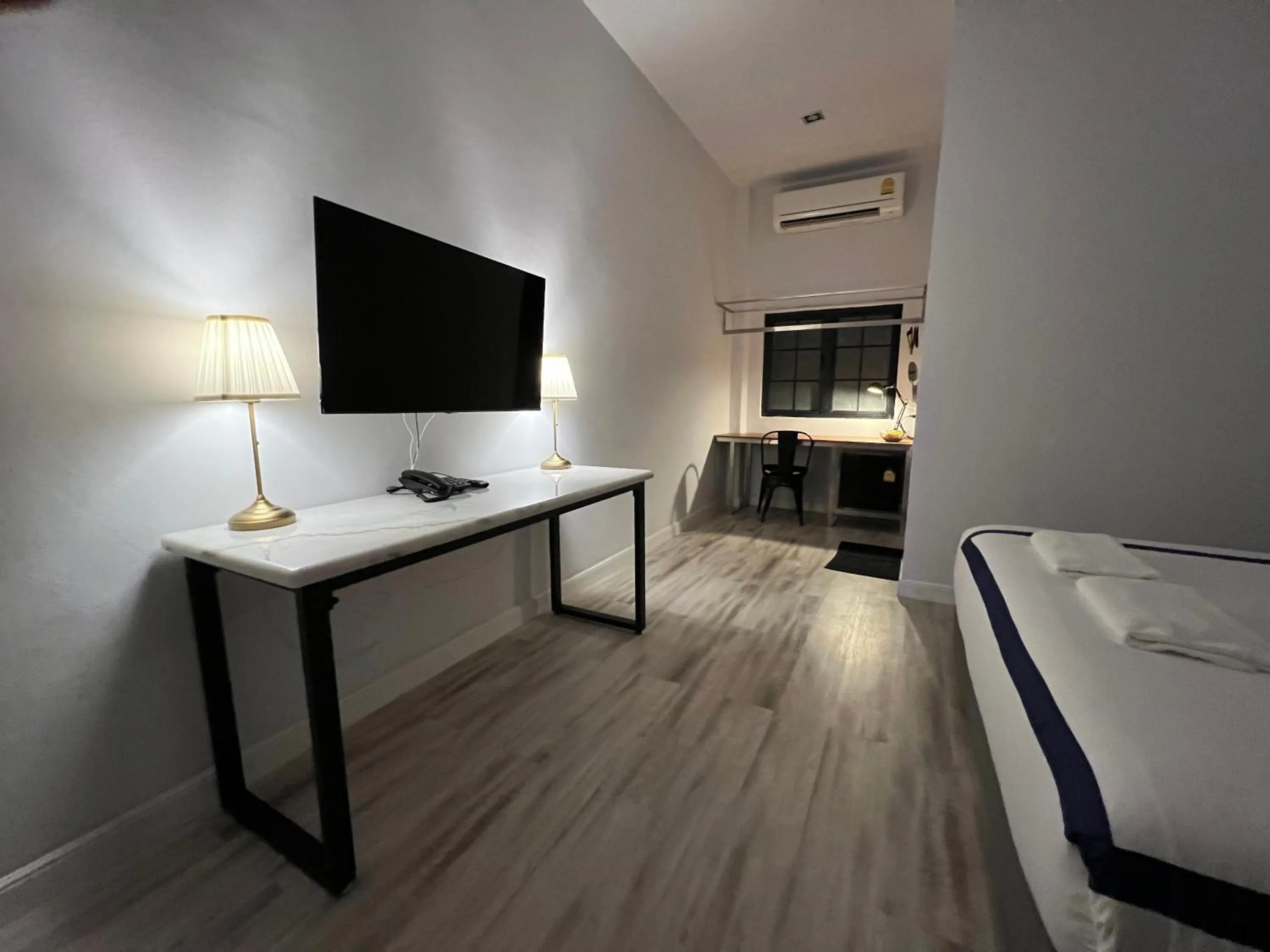 Bed in Macchiato Resort Savannakhet Opposite Thai Embassy