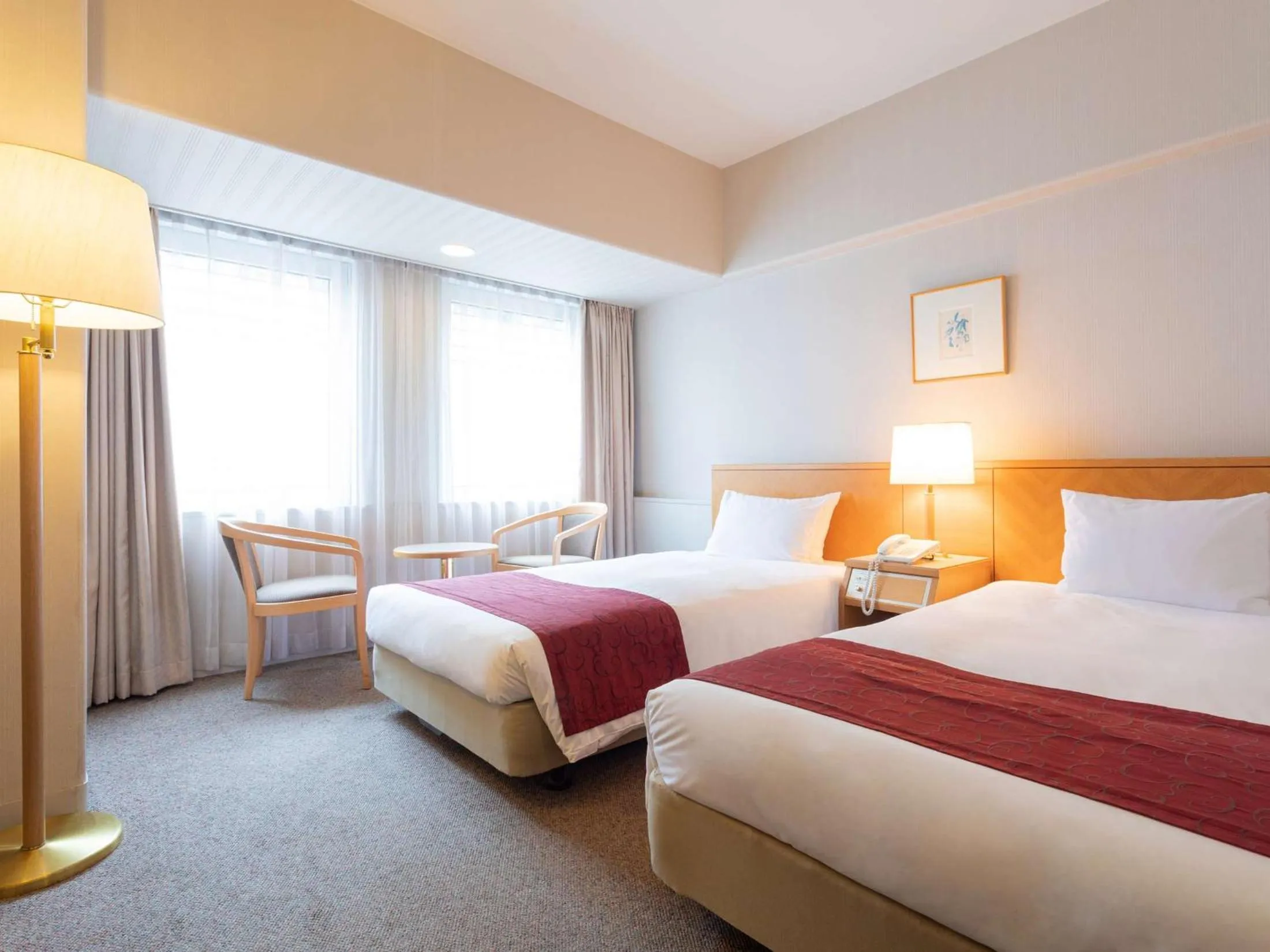 Bed in The Saihokukan Hotel