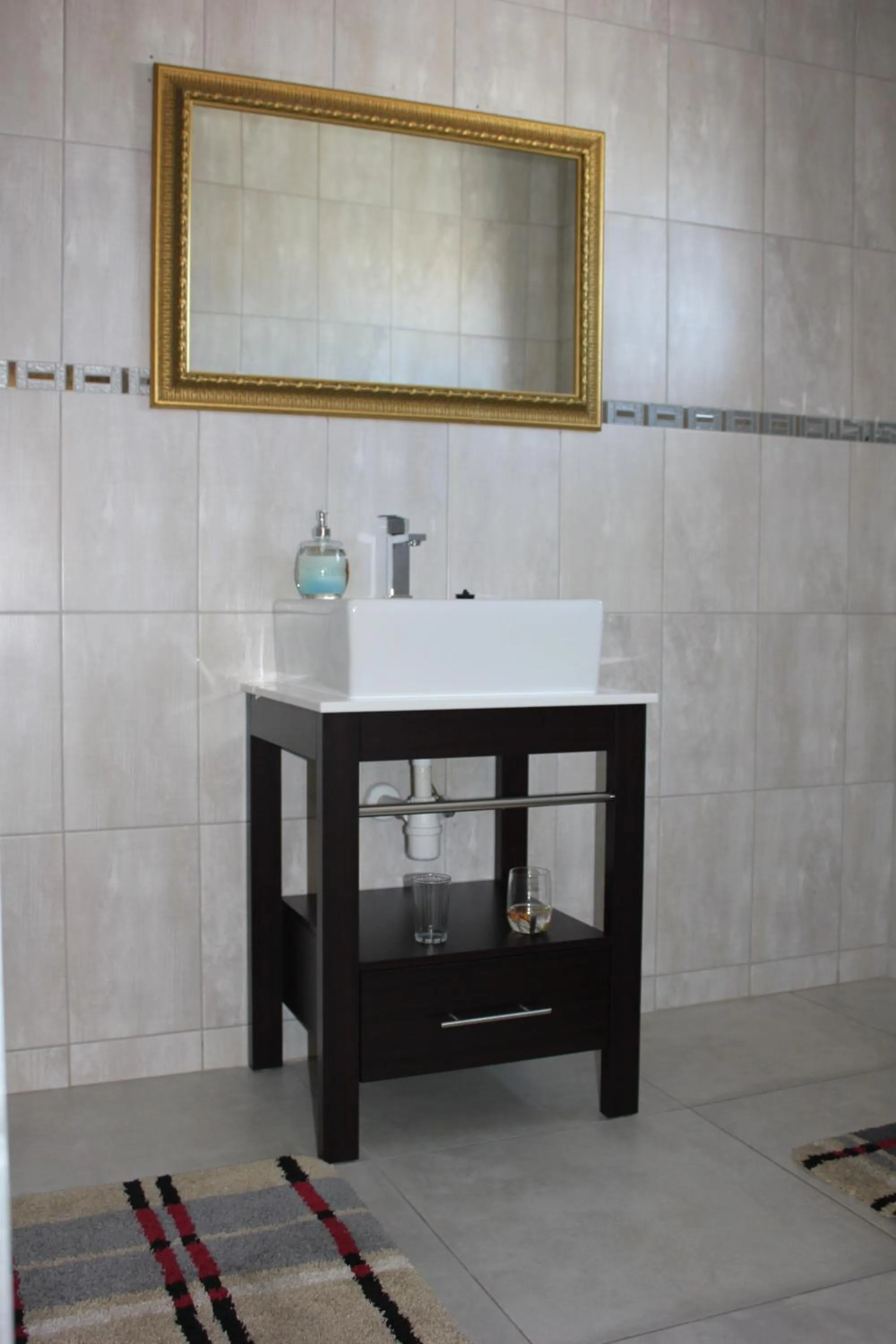 Bathroom in Coco Palm Bed & Breakfast