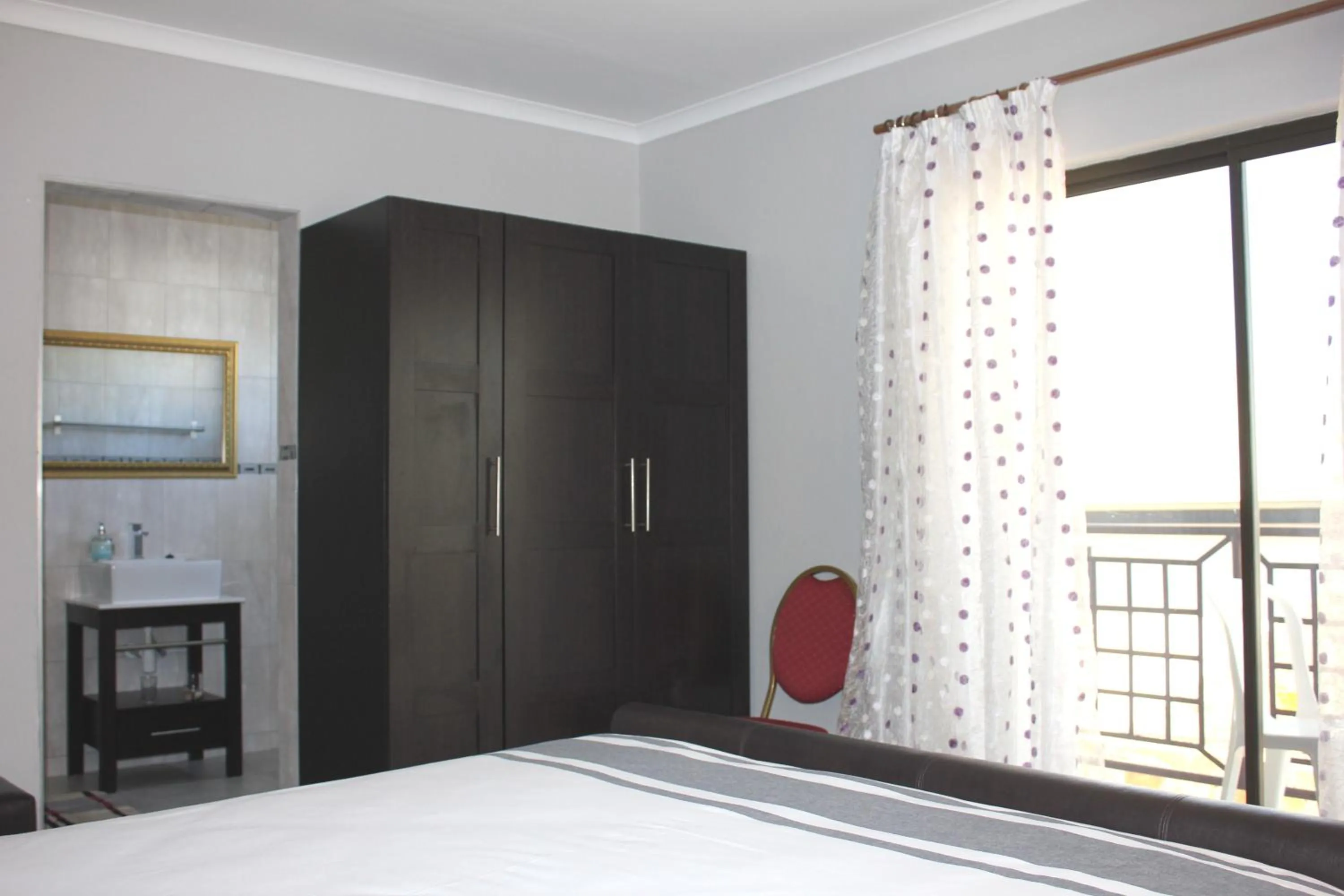 wardrobe in Coco Palm Bed & Breakfast