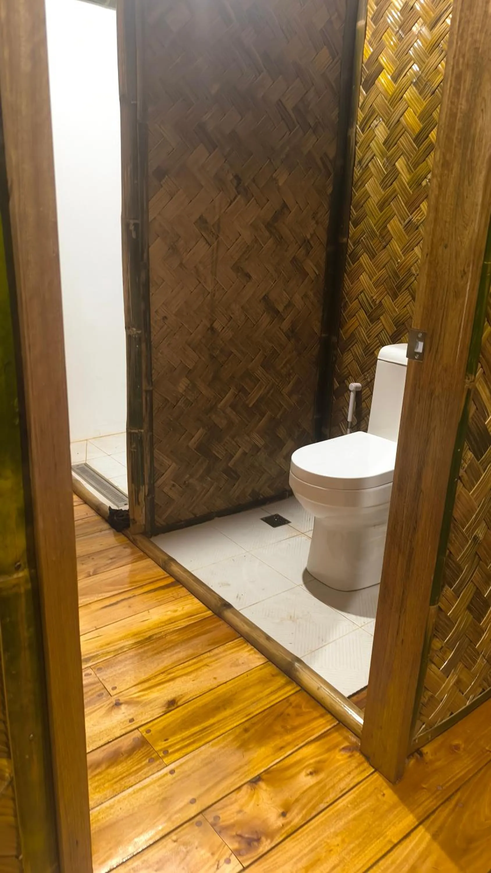 Toilet in Ocean Green Eco Lodge