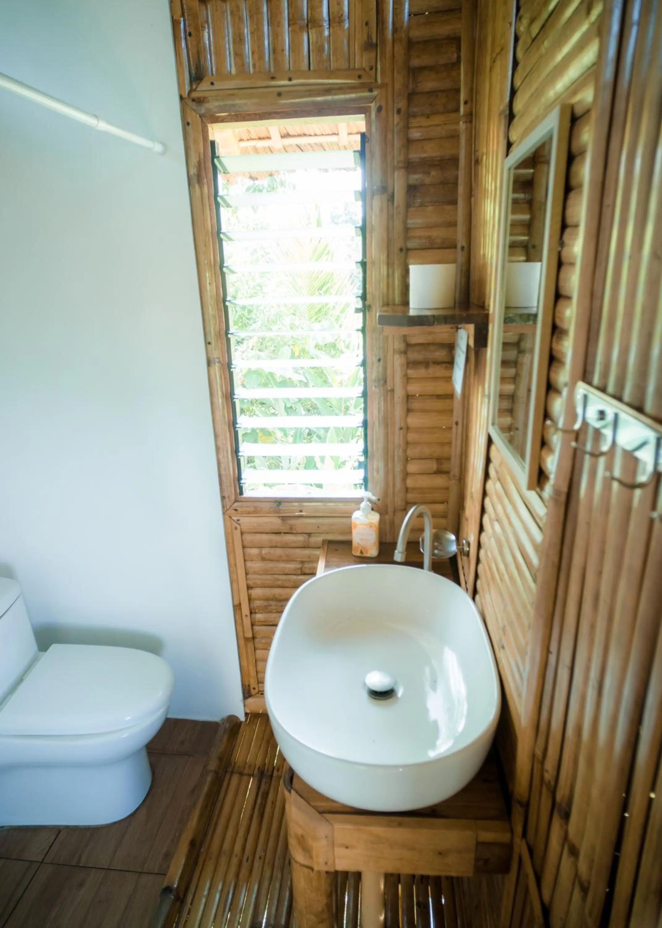 Toilet in Ocean Green Eco Lodge