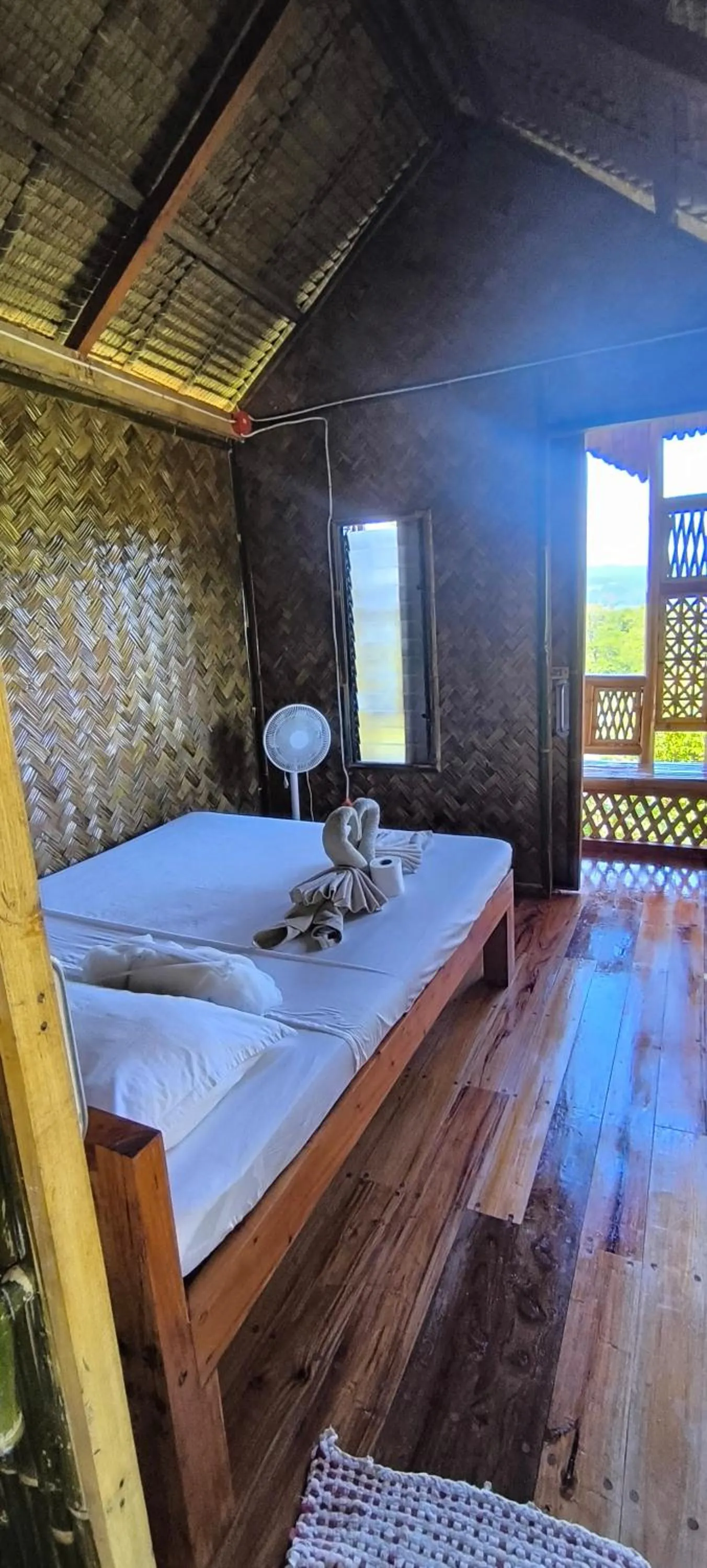 Bed in Ocean Green Eco Lodge