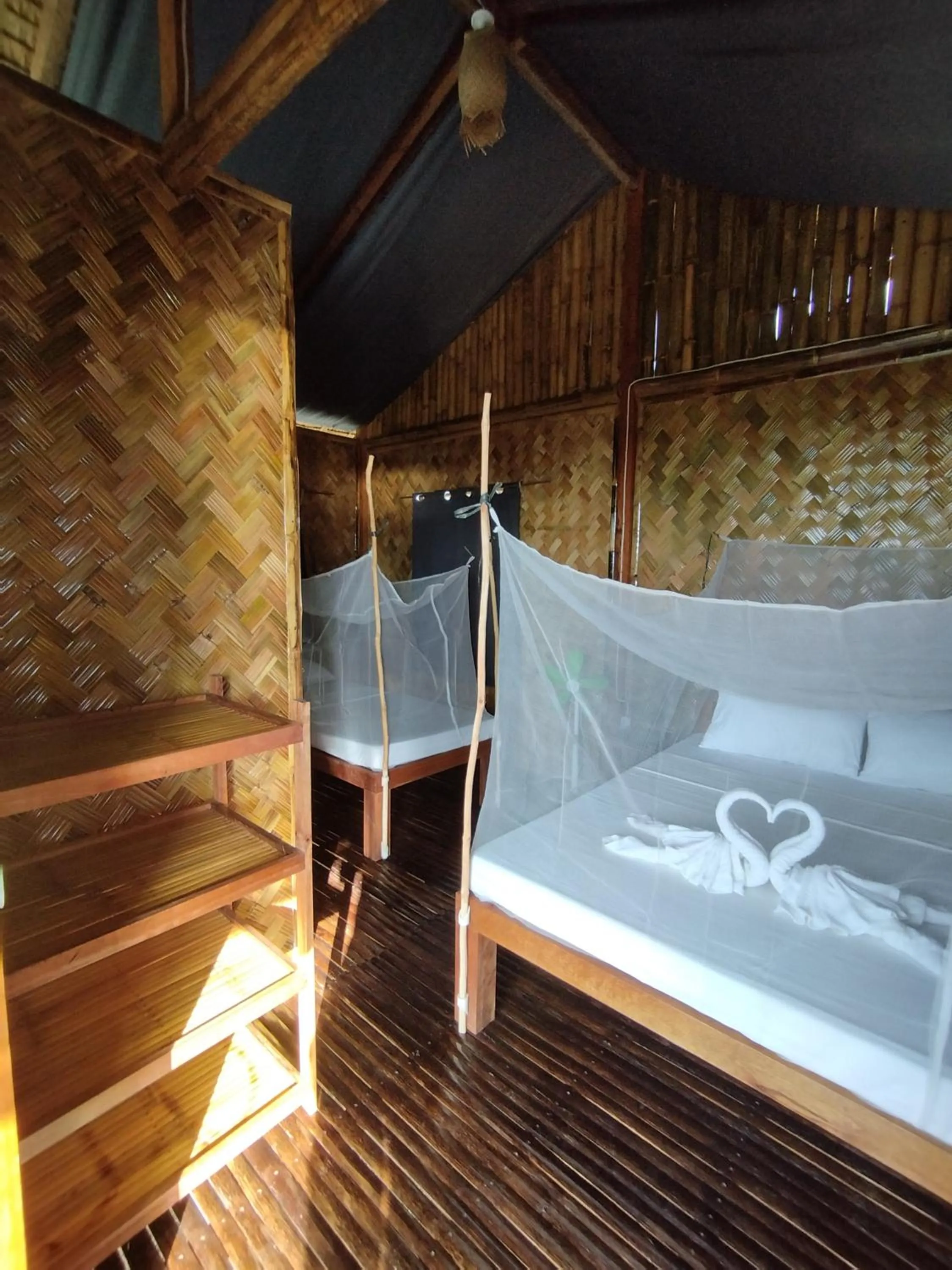 Bed in Ocean Green Eco Lodge