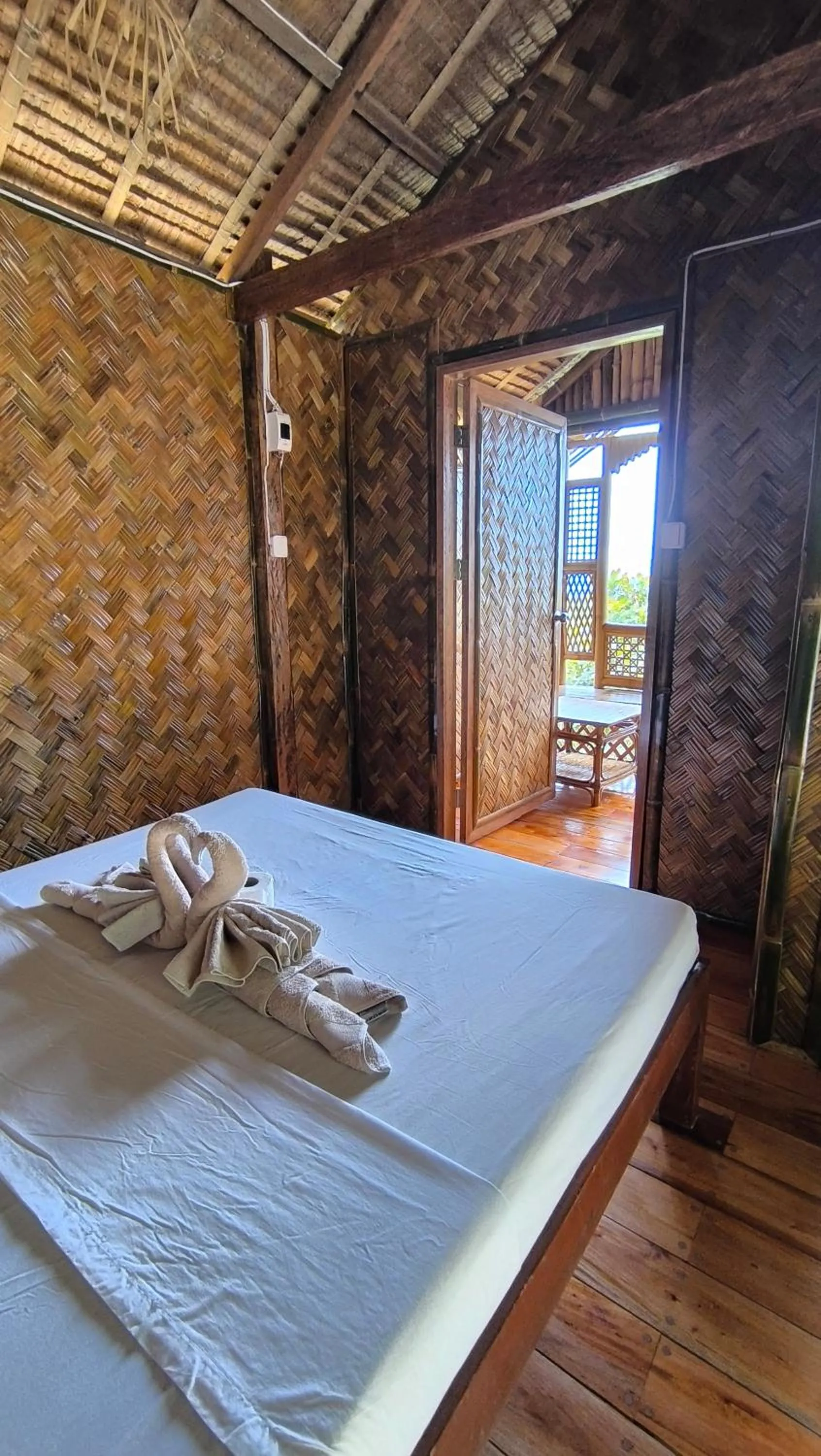 Bed in Ocean Green Eco Lodge