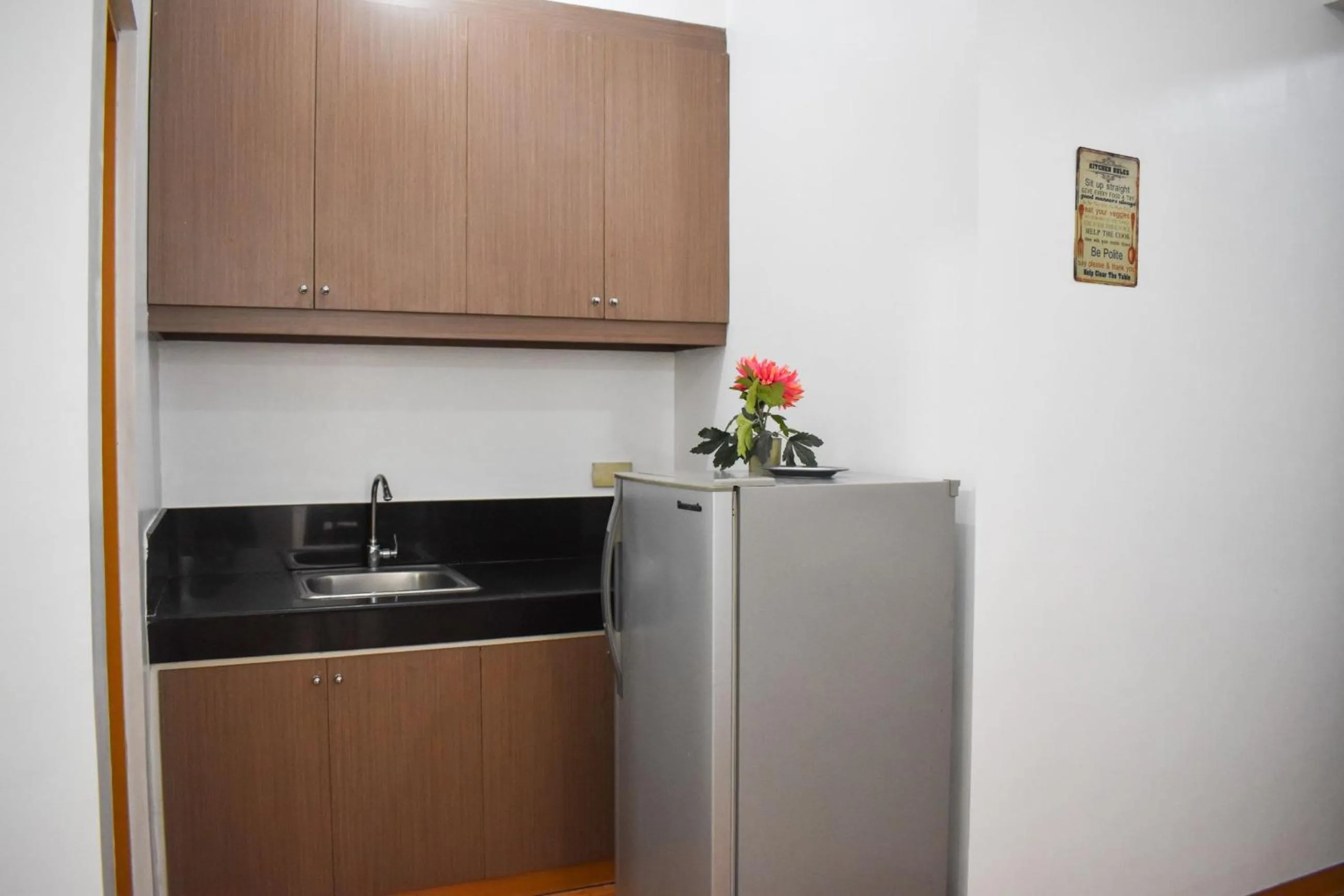 Kitchen or kitchenette in The Boni Tower by RSPL Manila City Center