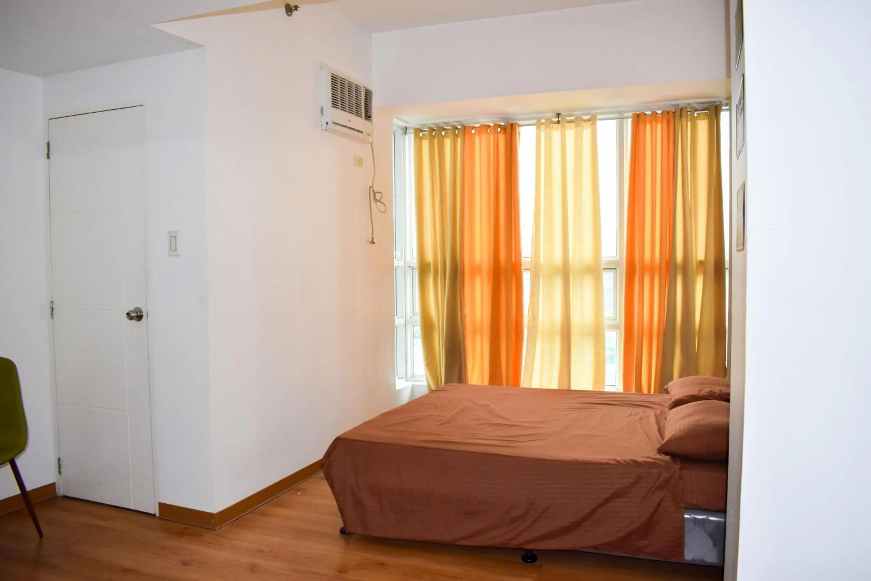 Photo of the whole room, Bed in The Boni Tower by RSPL Manila City Center