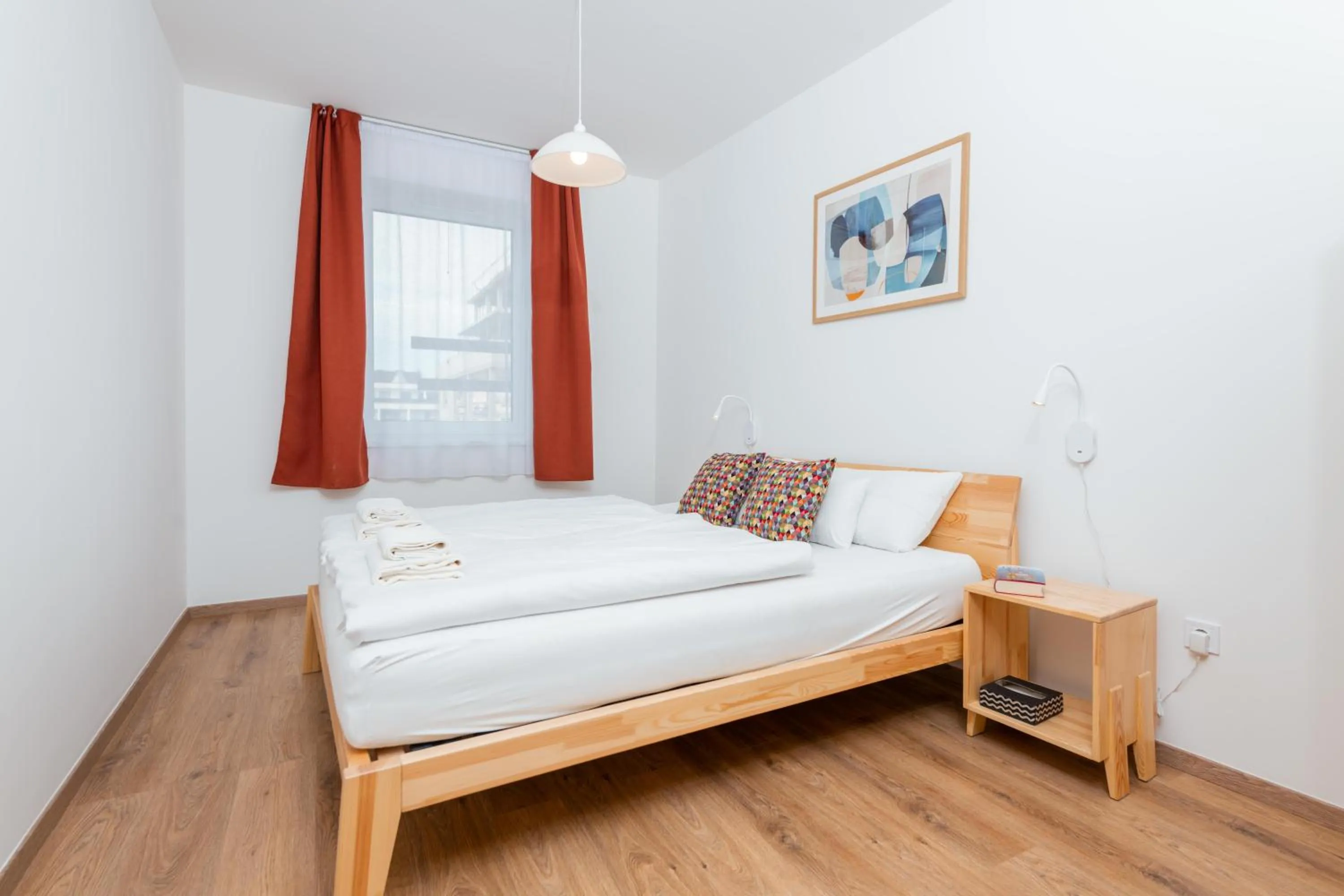 Bed in WestSide Apartments by FirstHost