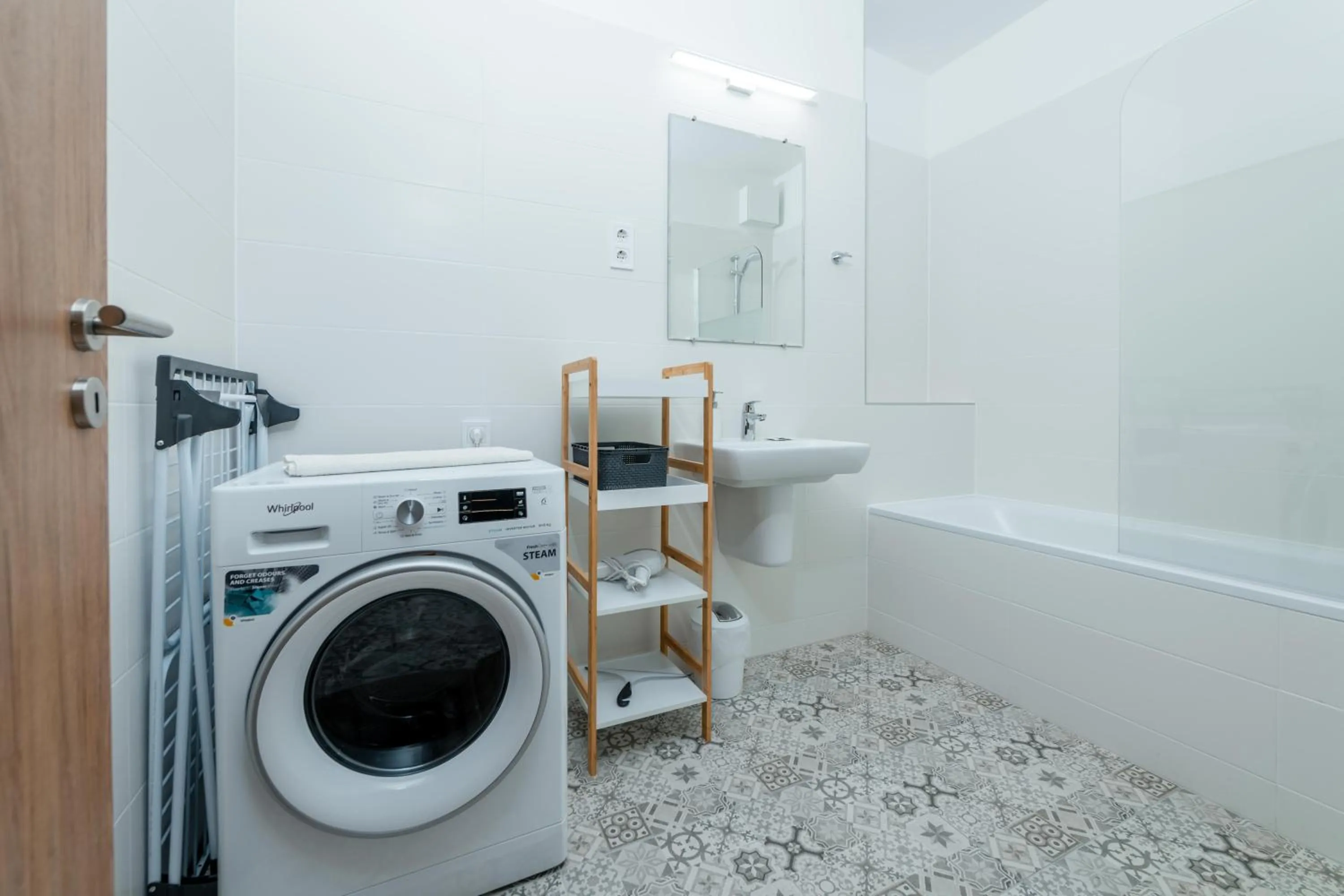 Shower in WestSide Apartments by FirstHost