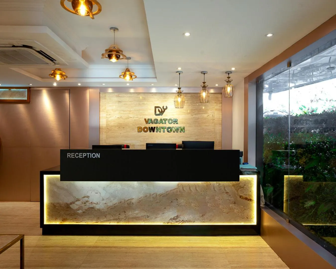 Property logo or sign in Vagator Downtown By VDP