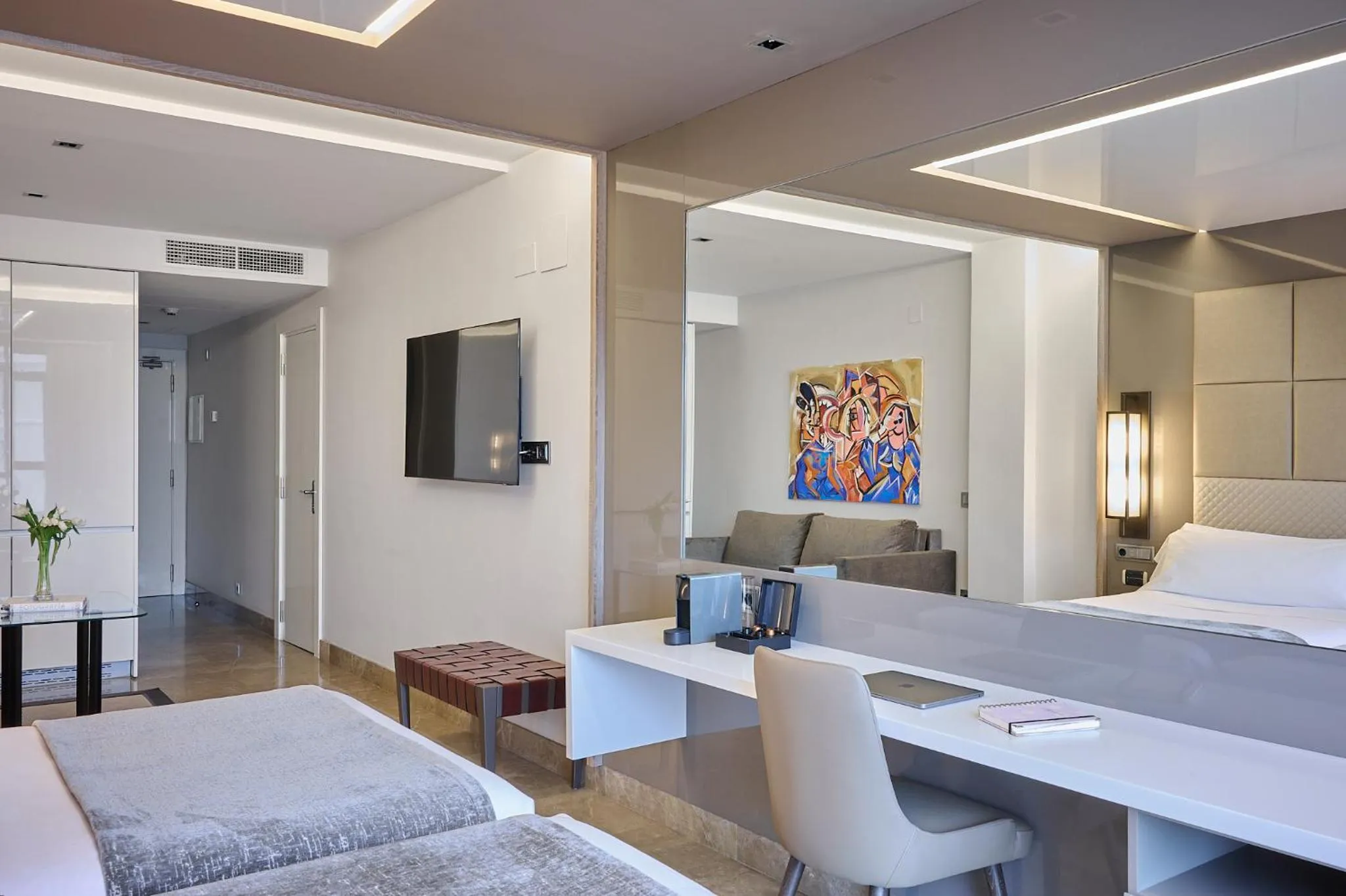 Seating area, Bed in VP Madroño