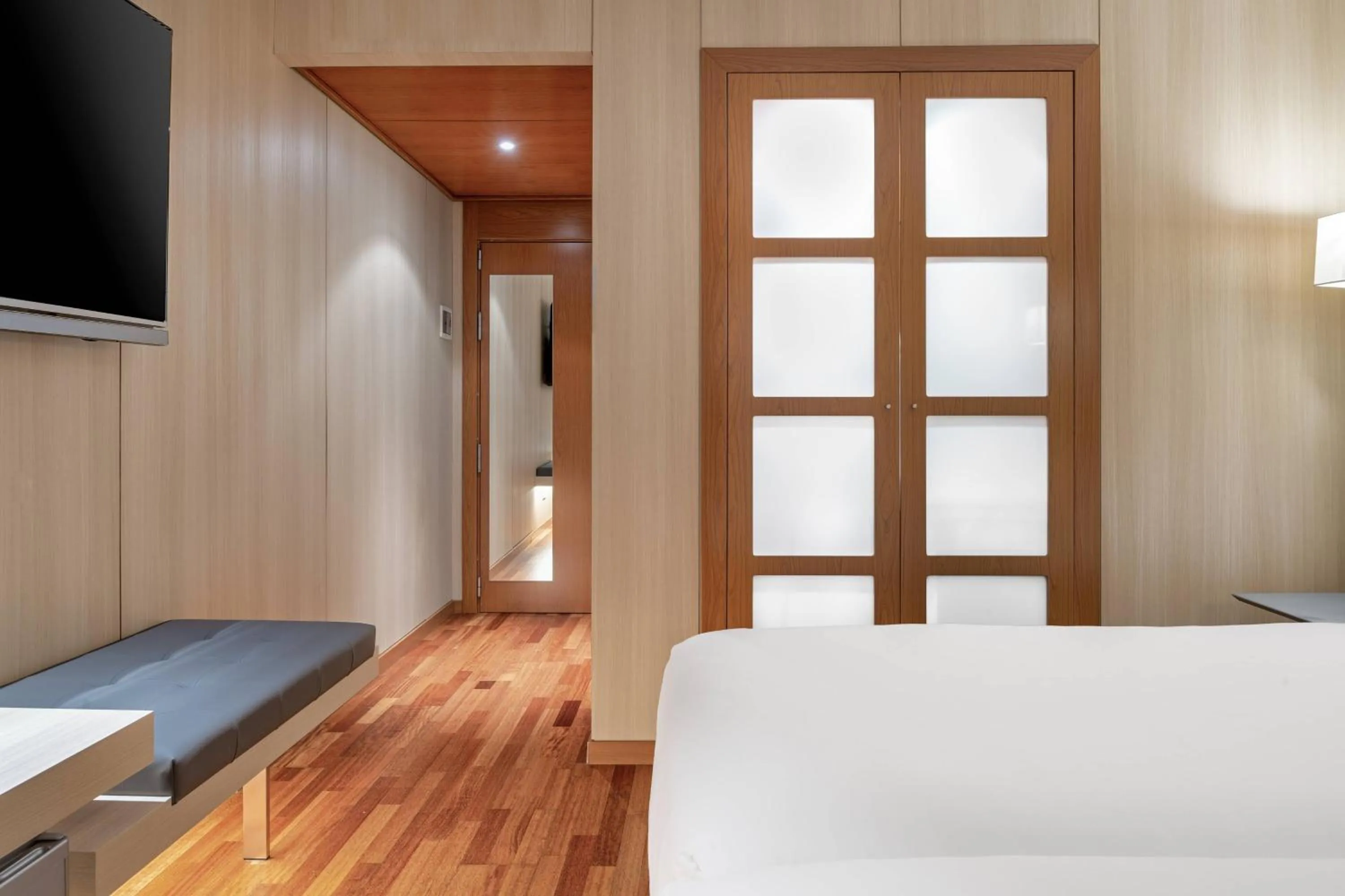 Photo of the whole room, Bed in AC Hotel Huelva by Marriott