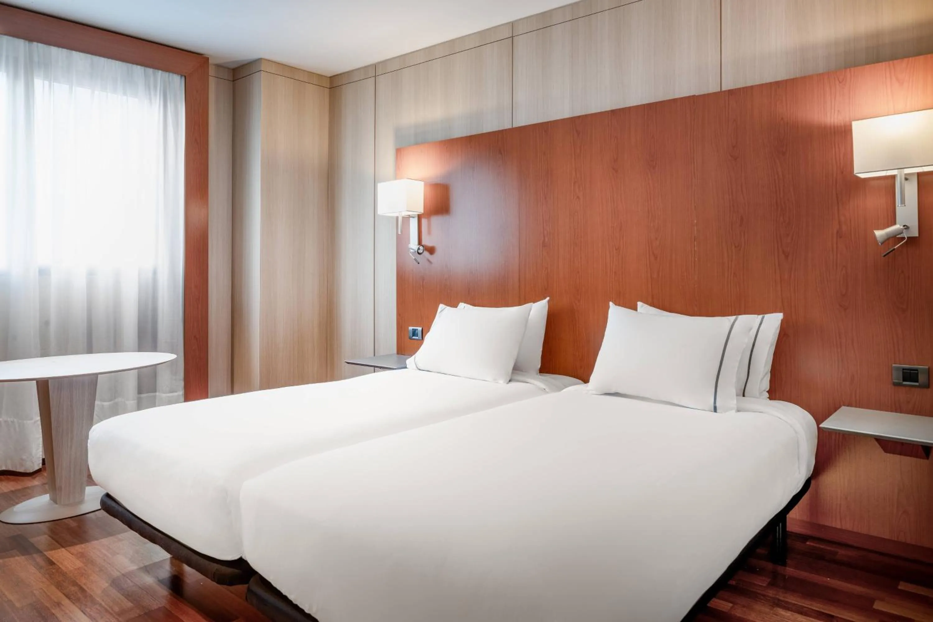 Photo of the whole room, Bed in AC Hotel Huelva by Marriott