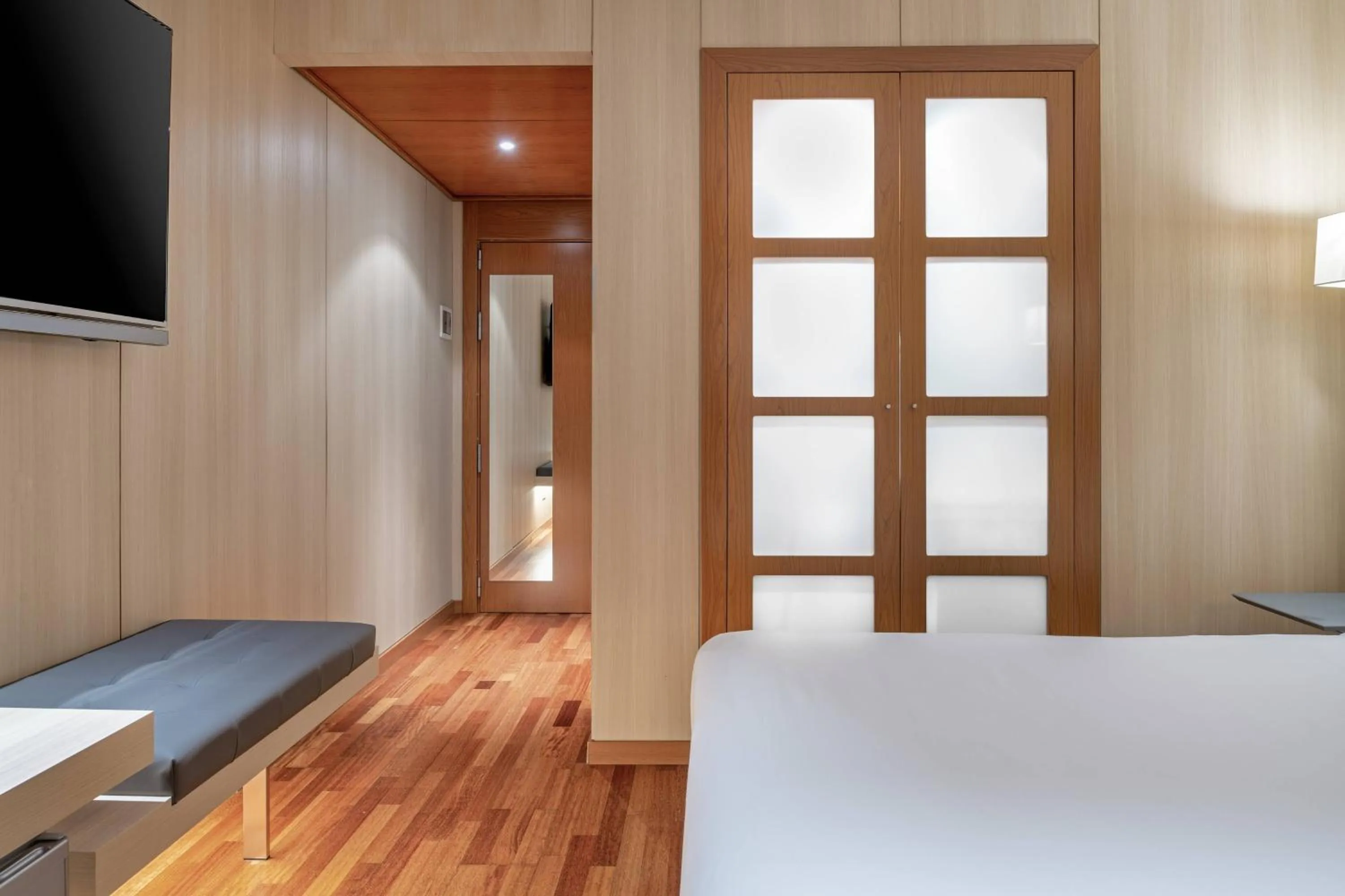 Photo of the whole room, Bed in AC Hotel Huelva by Marriott