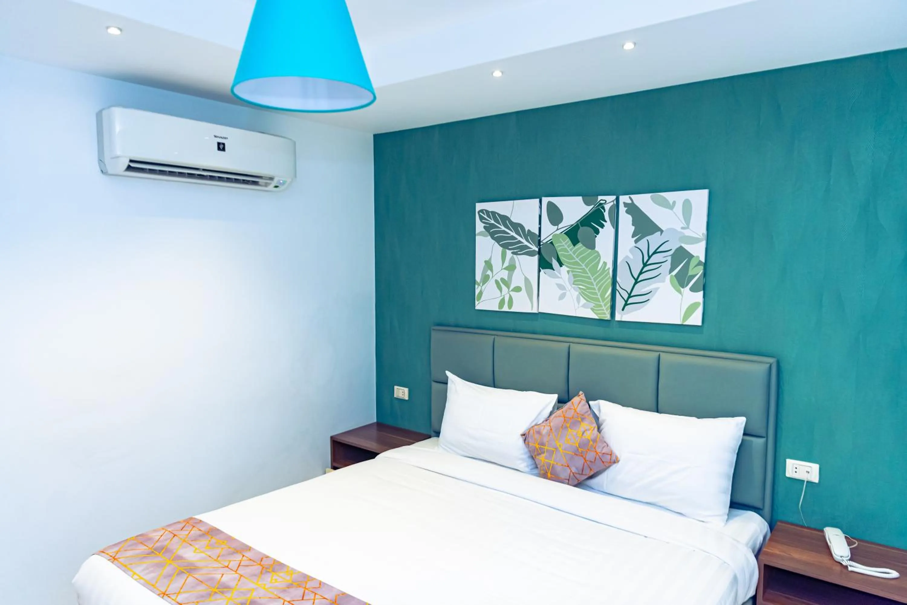 Bed in Jasmine Pyramids Hotel