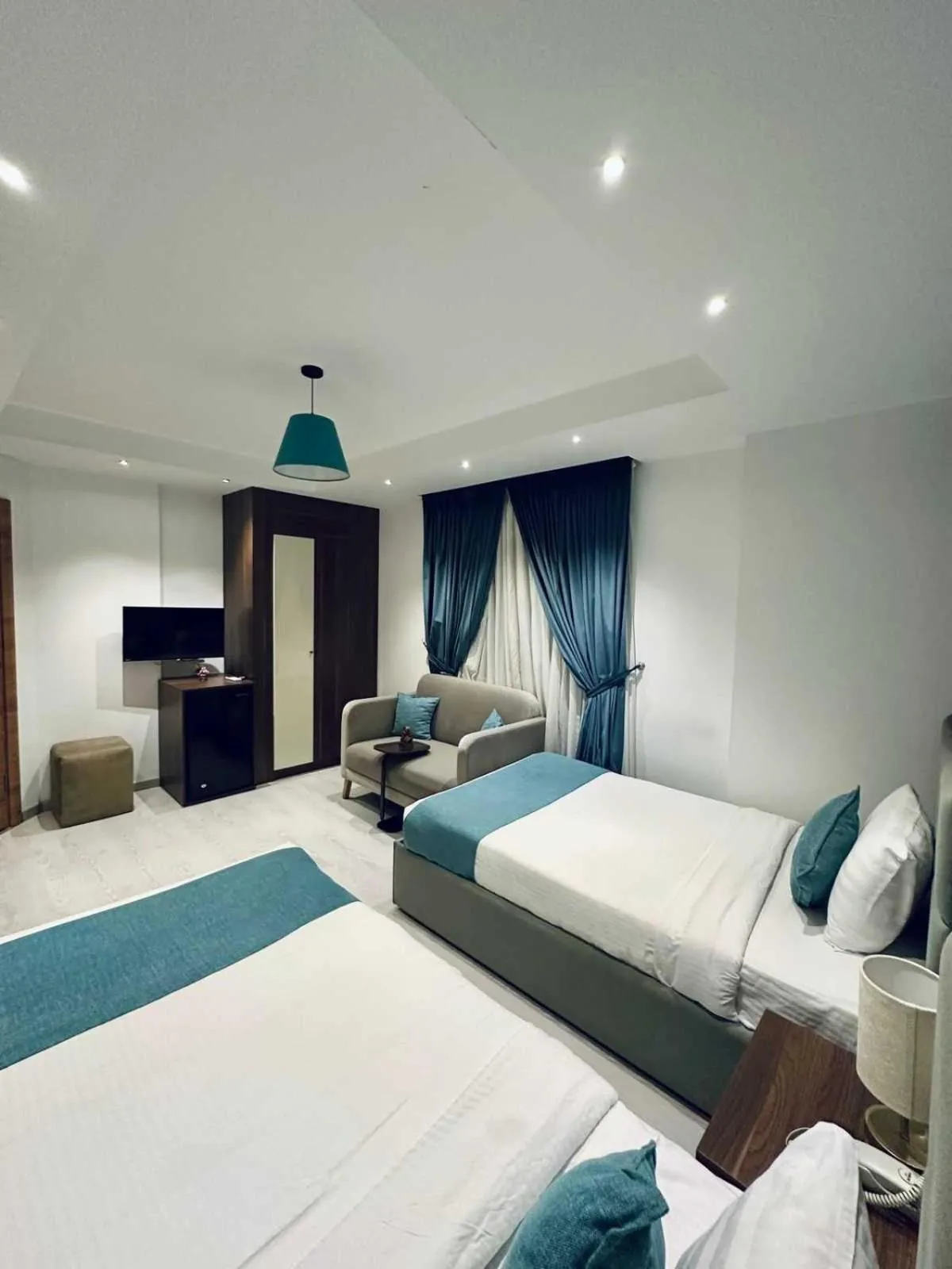 Bed in Jasmine Pyramids Hotel