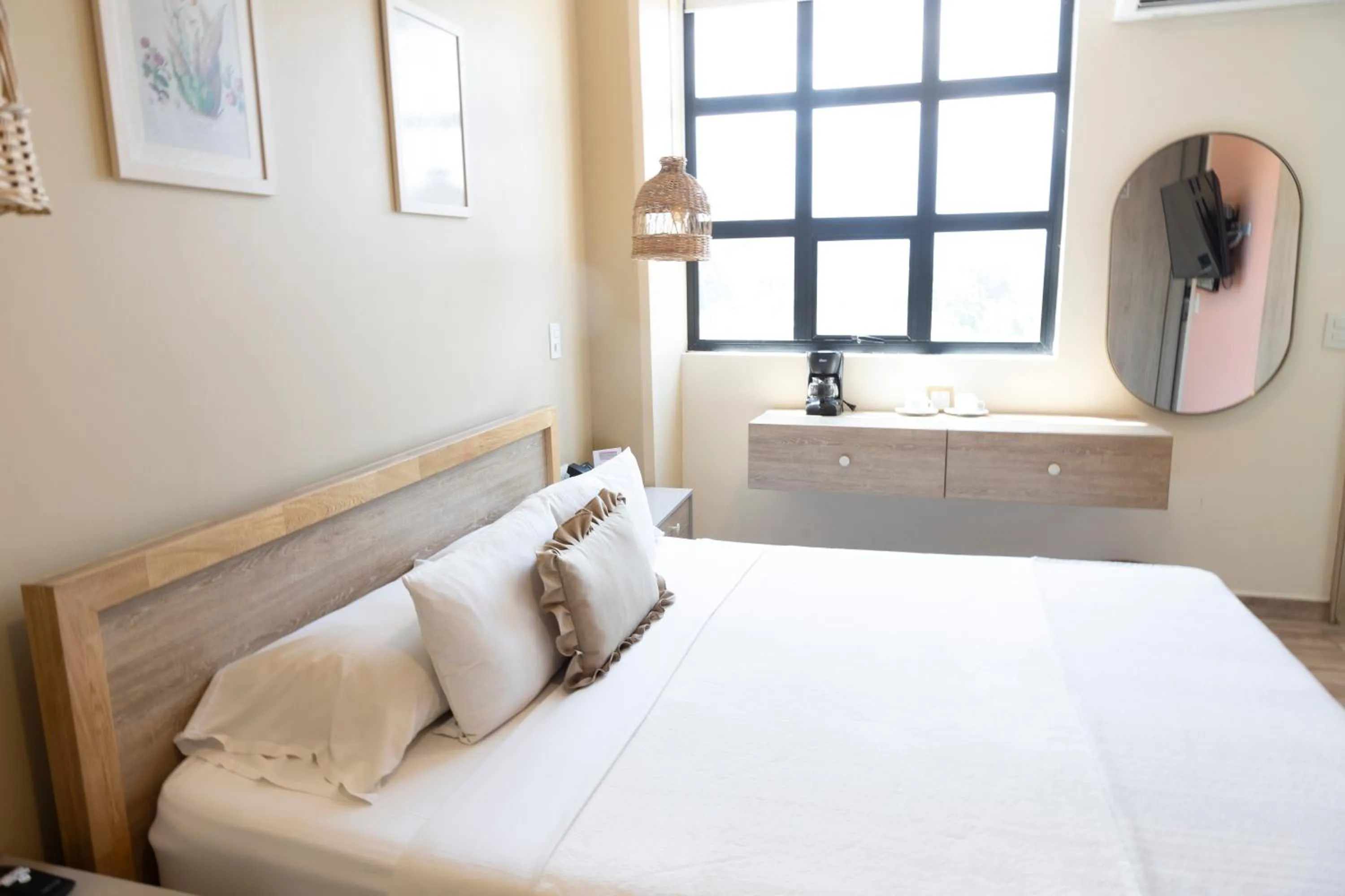 Bed in Mythical Hotel Boutique