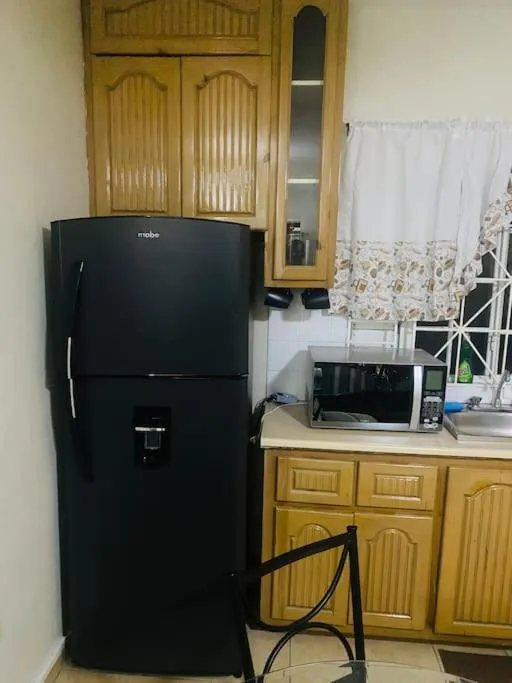 Kitchen or kitchenette in Club Caribbean Apartments