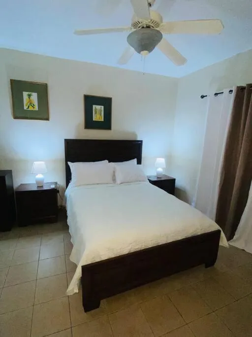 Bedroom, Bed in Club Caribbean Apartments