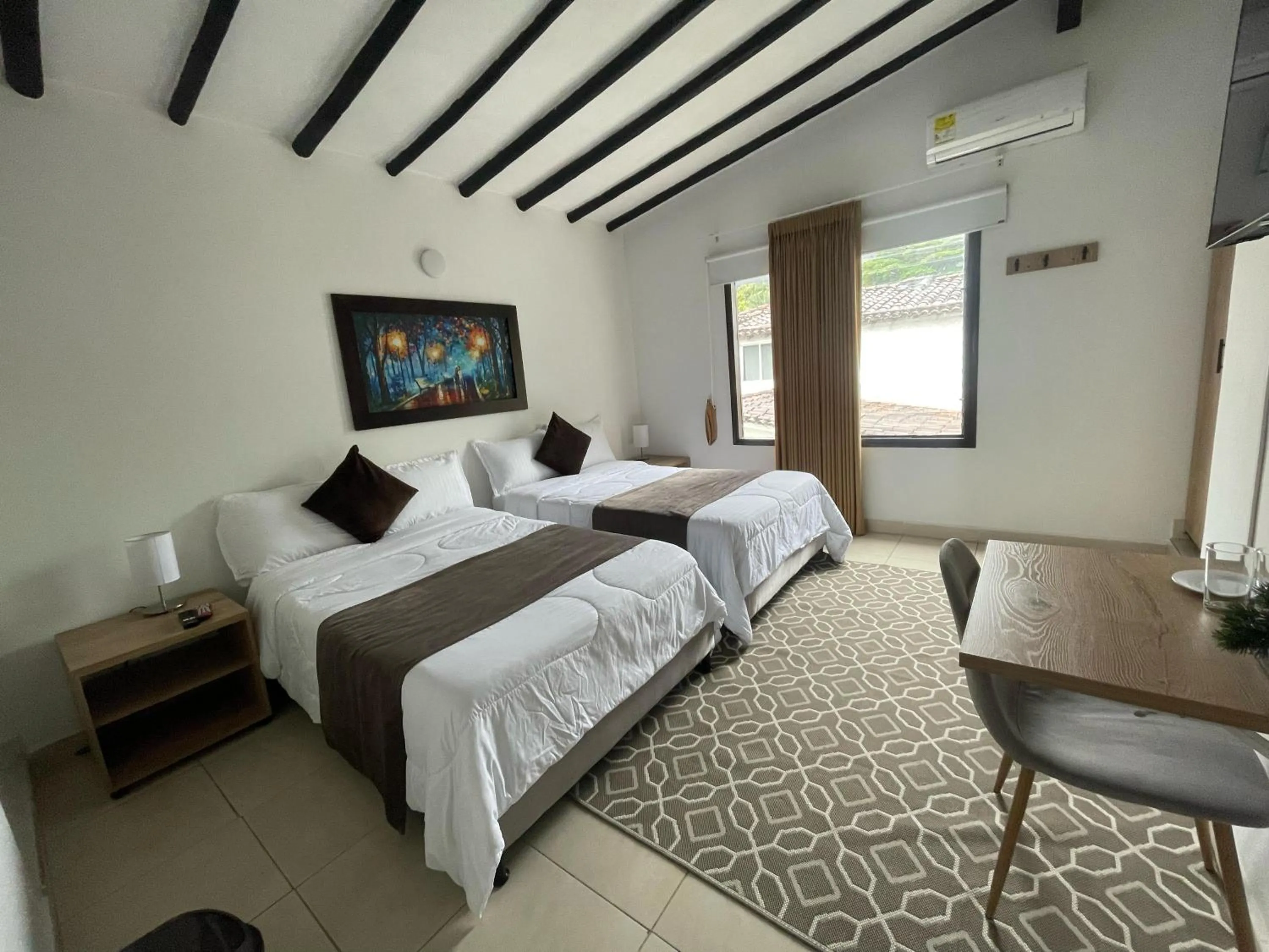 Bed in Aguacatala Hotel Boutique