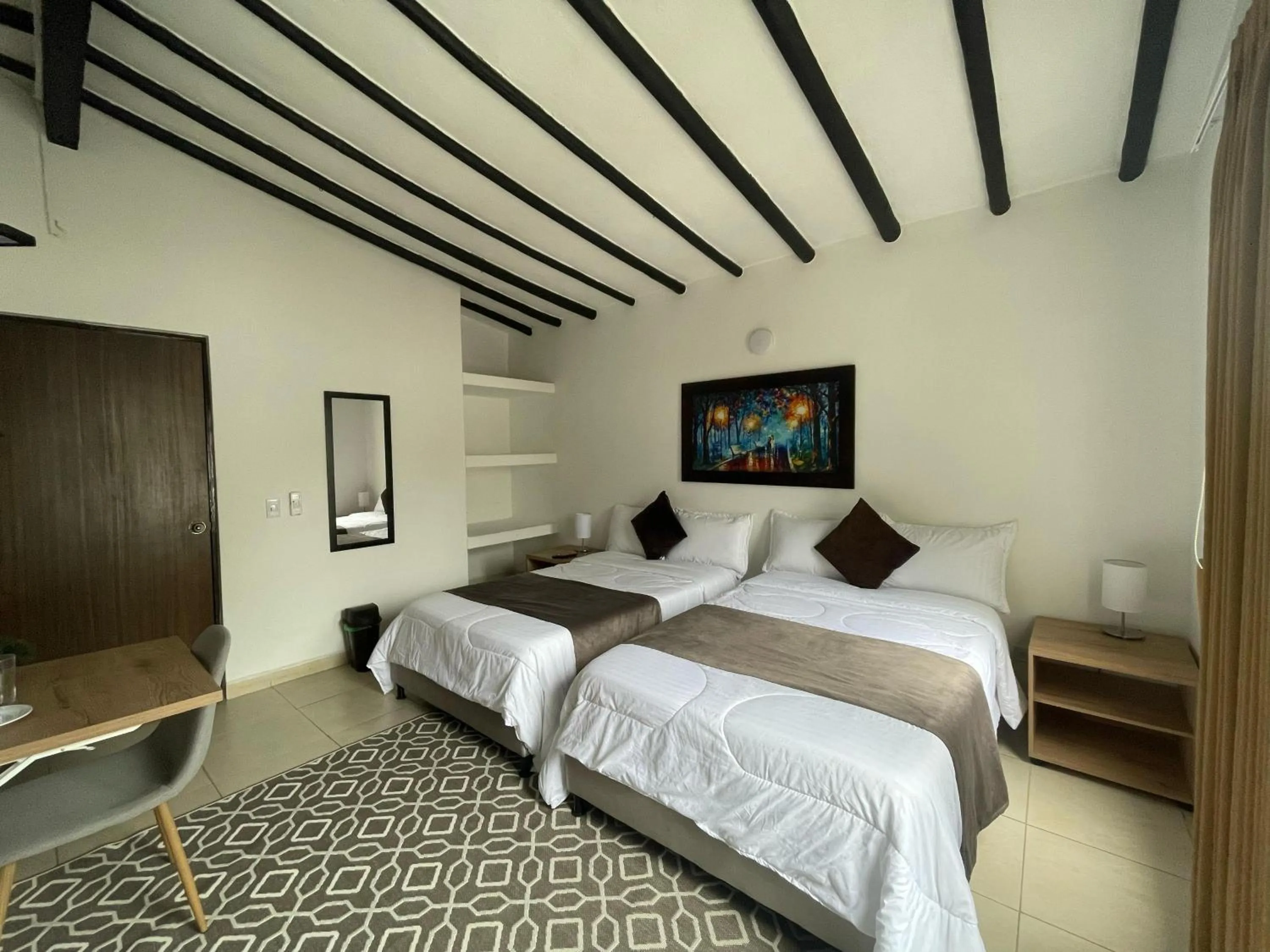 Bed in Aguacatala Hotel Boutique