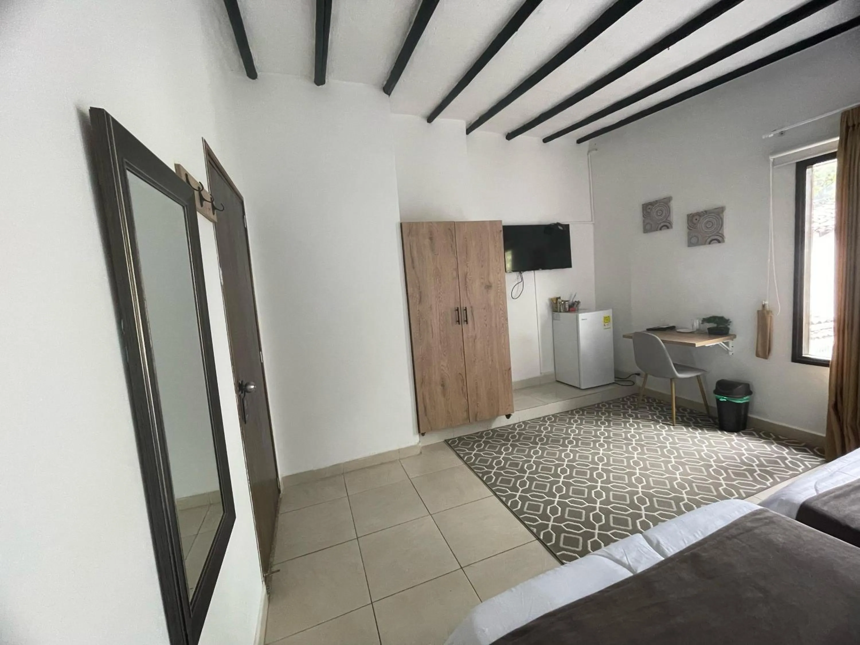 Bed in Aguacatala Hotel Boutique