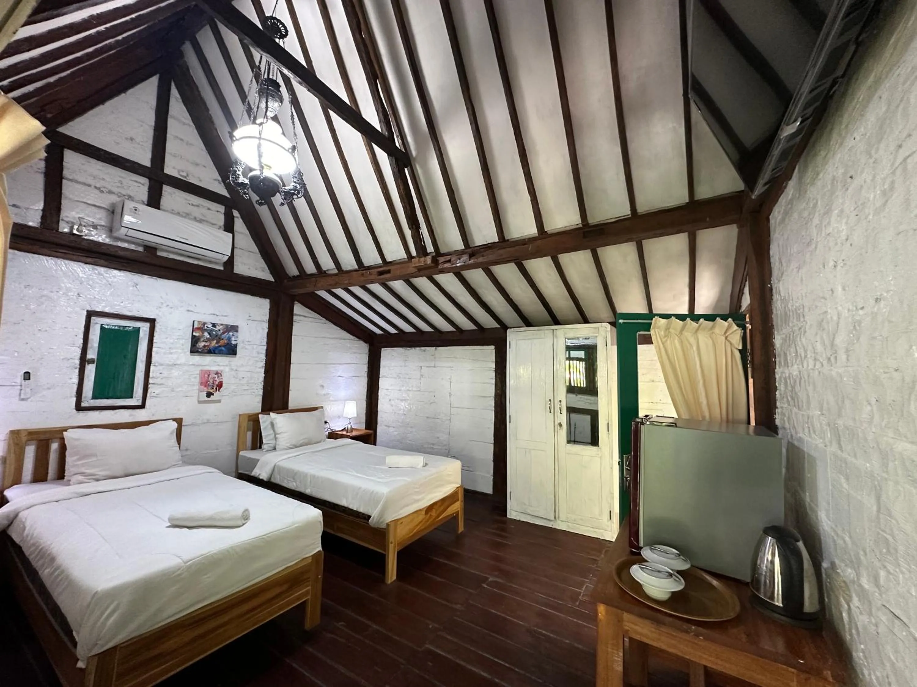 Bed in Tahlia's Villa