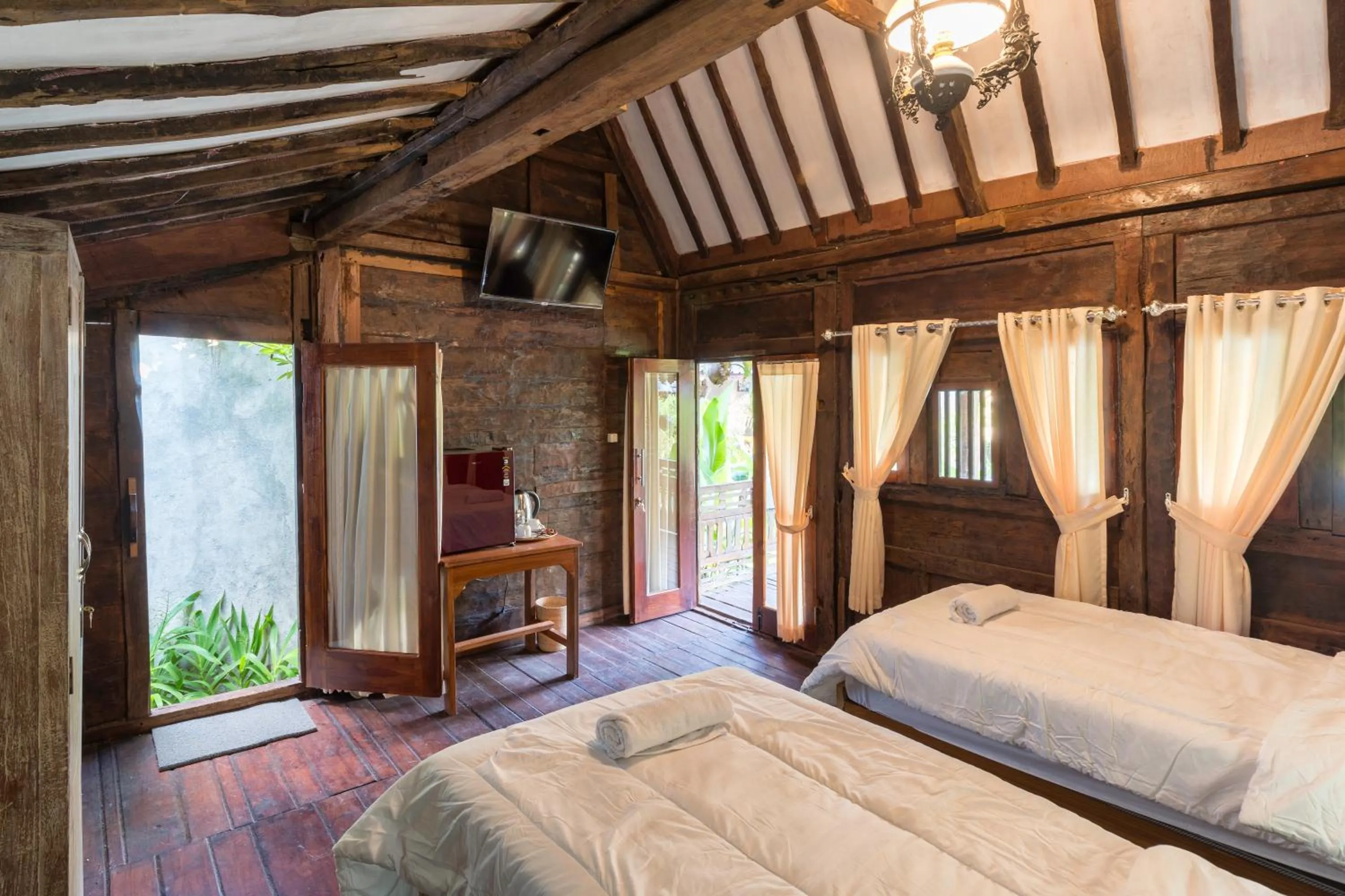 Bed in Tahlia's Villa