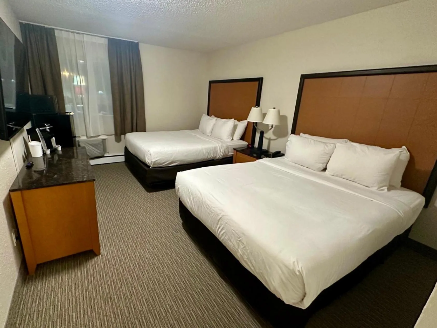 Bed in Anavada Inn & Suites - Grande Prairie
