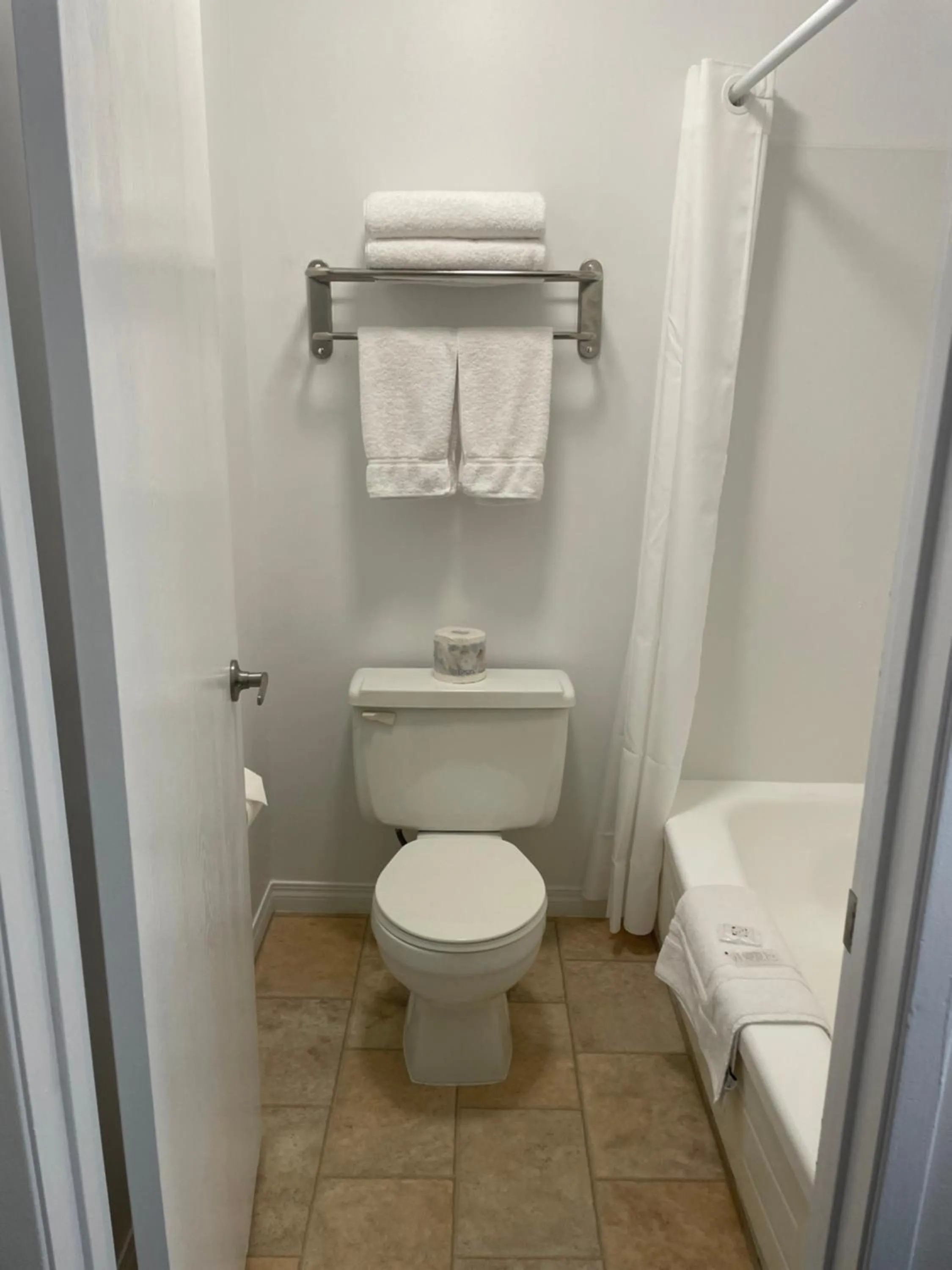 Toilet in Anavada Inn & Suites - Grande Prairie