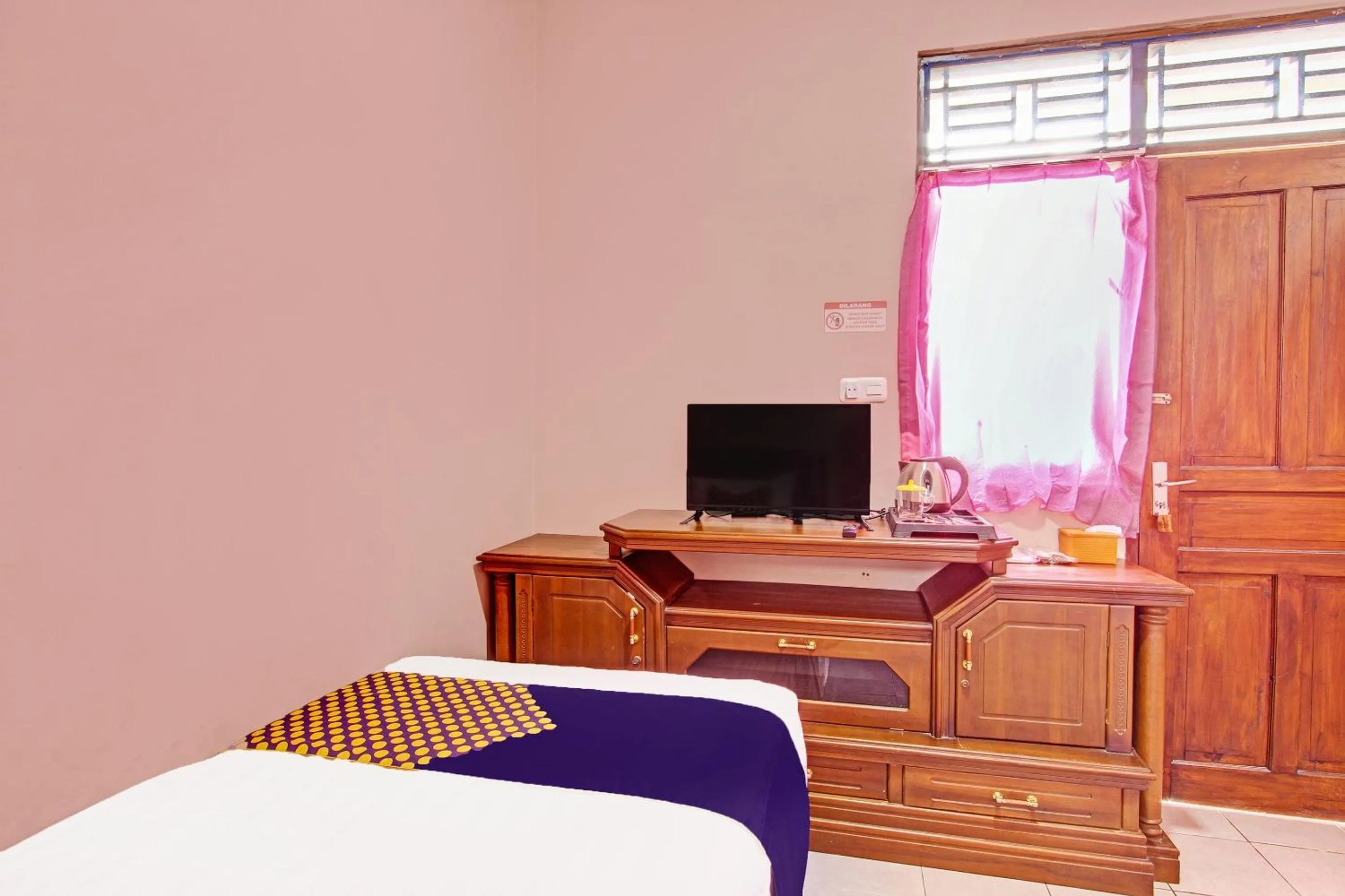 Bedroom in Hotel O Guest House Mustika Syariah Near alun alun kota purwokerto