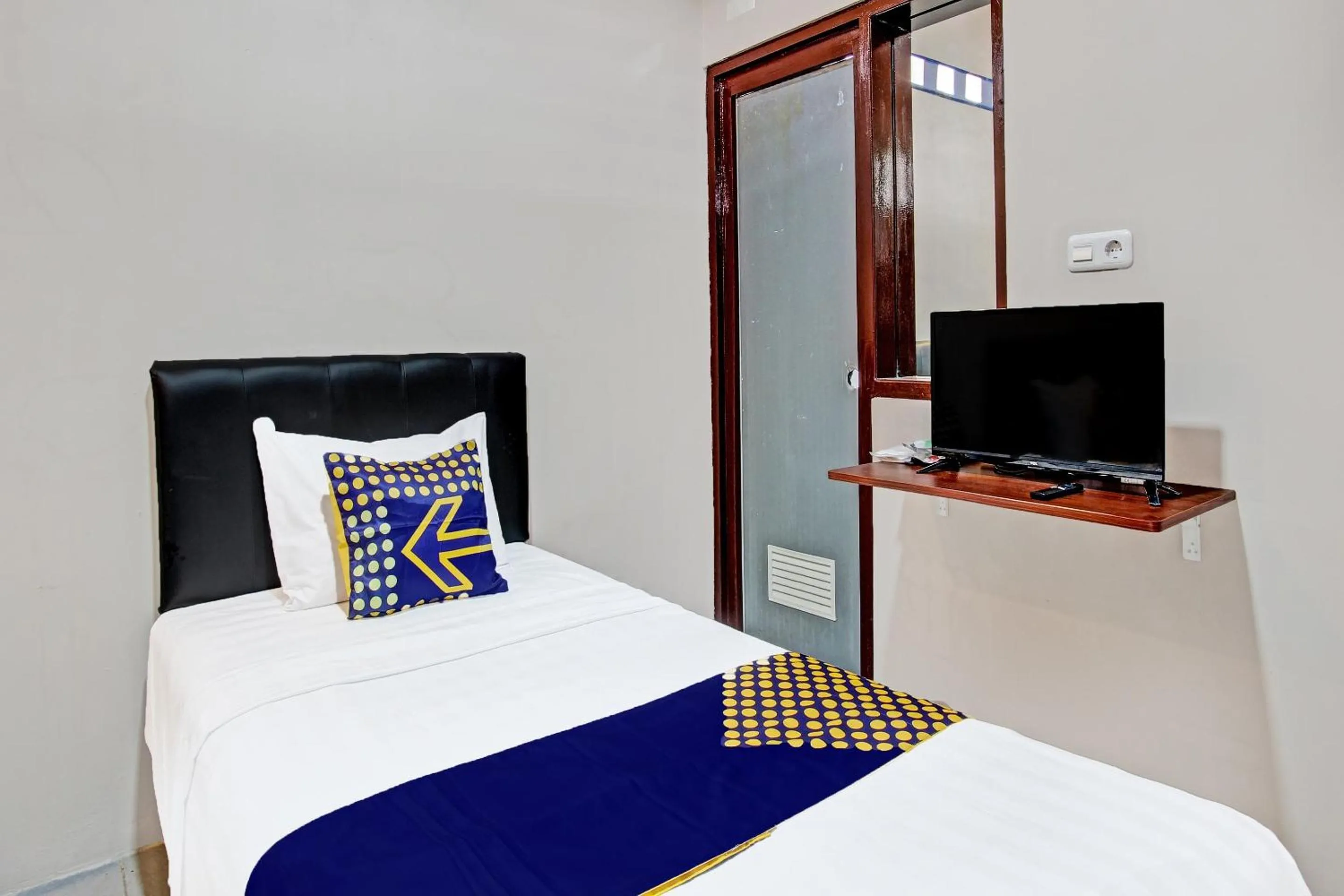 Bedroom in Hotel O Guest House Mustika Syariah Near alun alun kota purwokerto