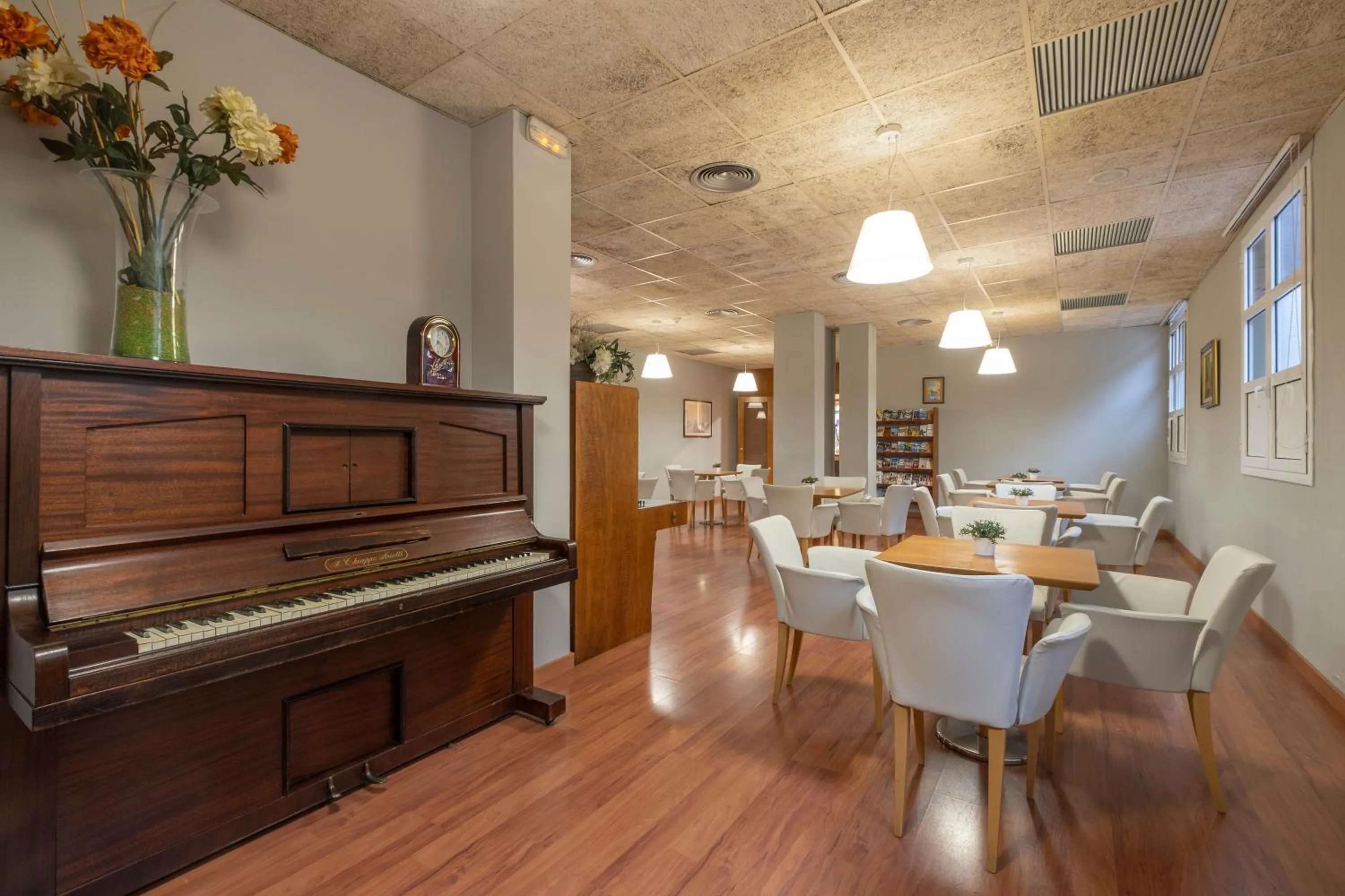 Communal lounge/ TV room in Rosamar & Spa 4*s