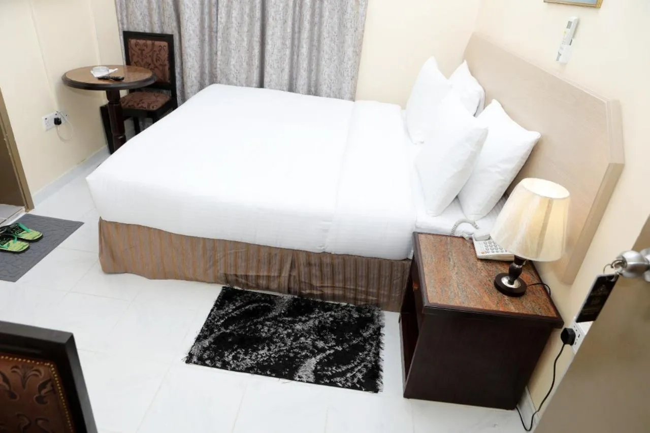 Bed in Blue Sky Way Hotel